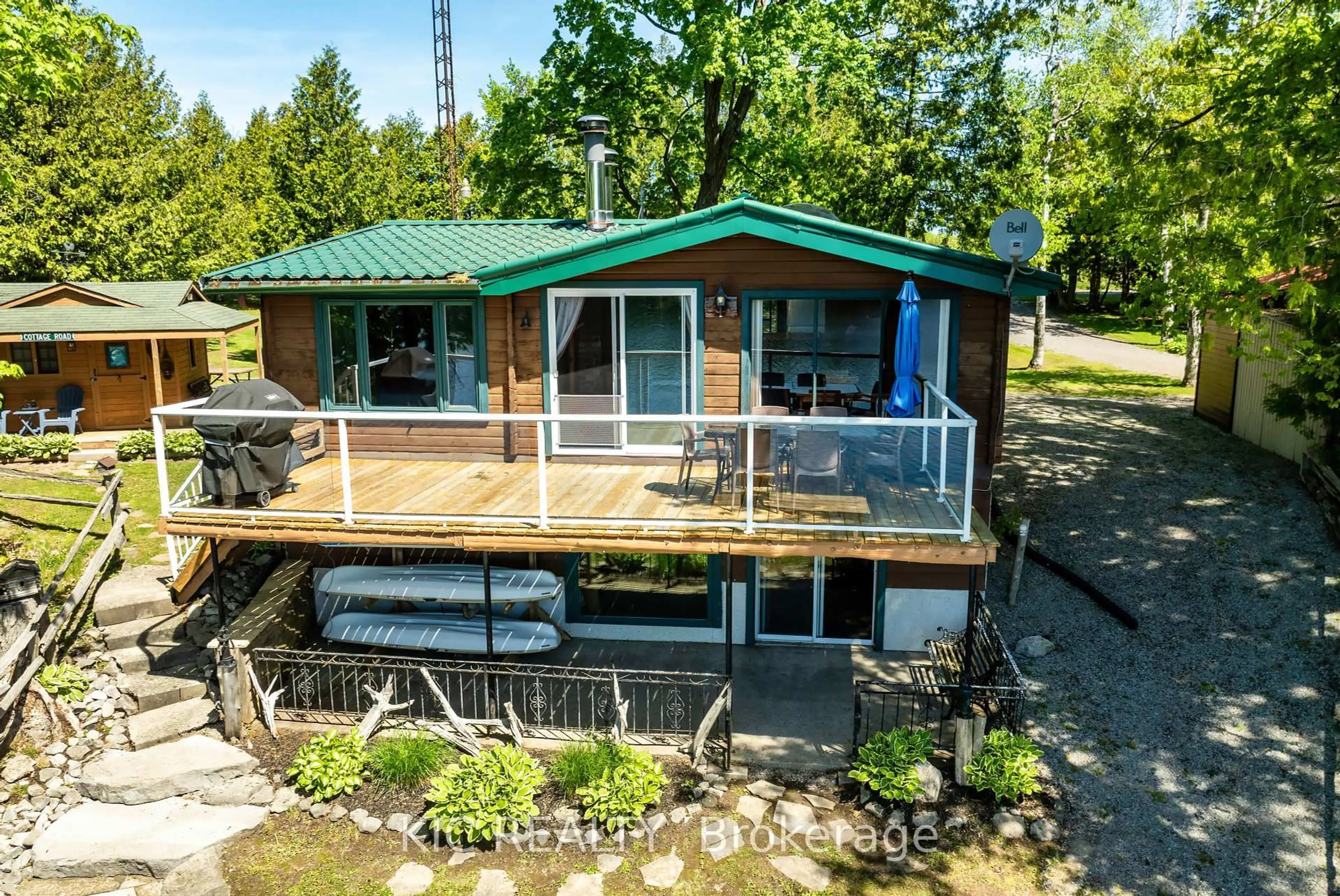 A pic from outside/outdoor area/front of a property/back of a property/a pic from drone, water/lake/river/ocean view for 4 Fire Route 61 Rte, Trent Lakes Ontario K0L 1J0