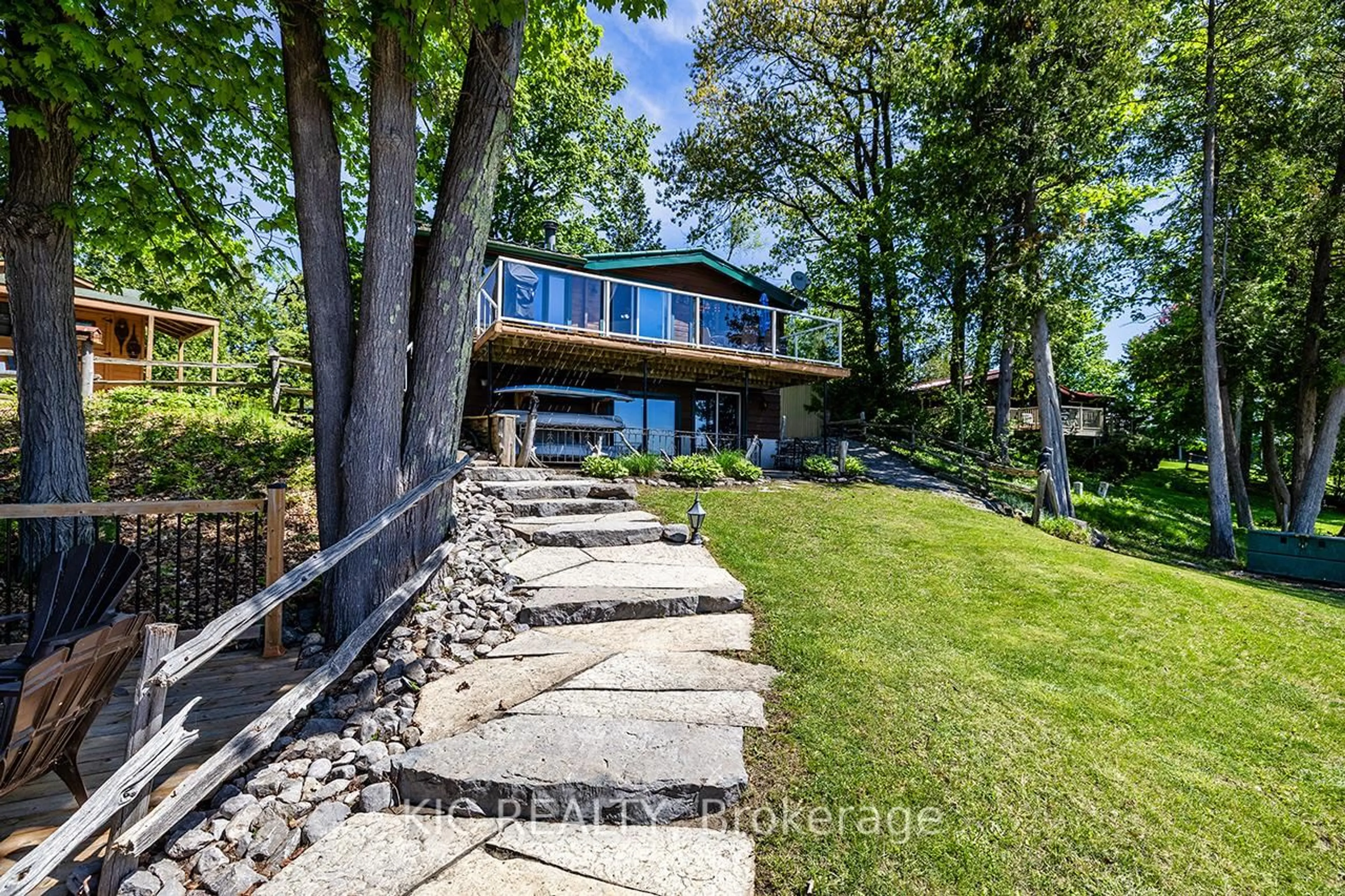 A pic from outside/outdoor area/front of a property/back of a property/a pic from drone, water/lake/river/ocean view for 4 Fire Route 61 Rte, Trent Lakes Ontario K0L 1J0