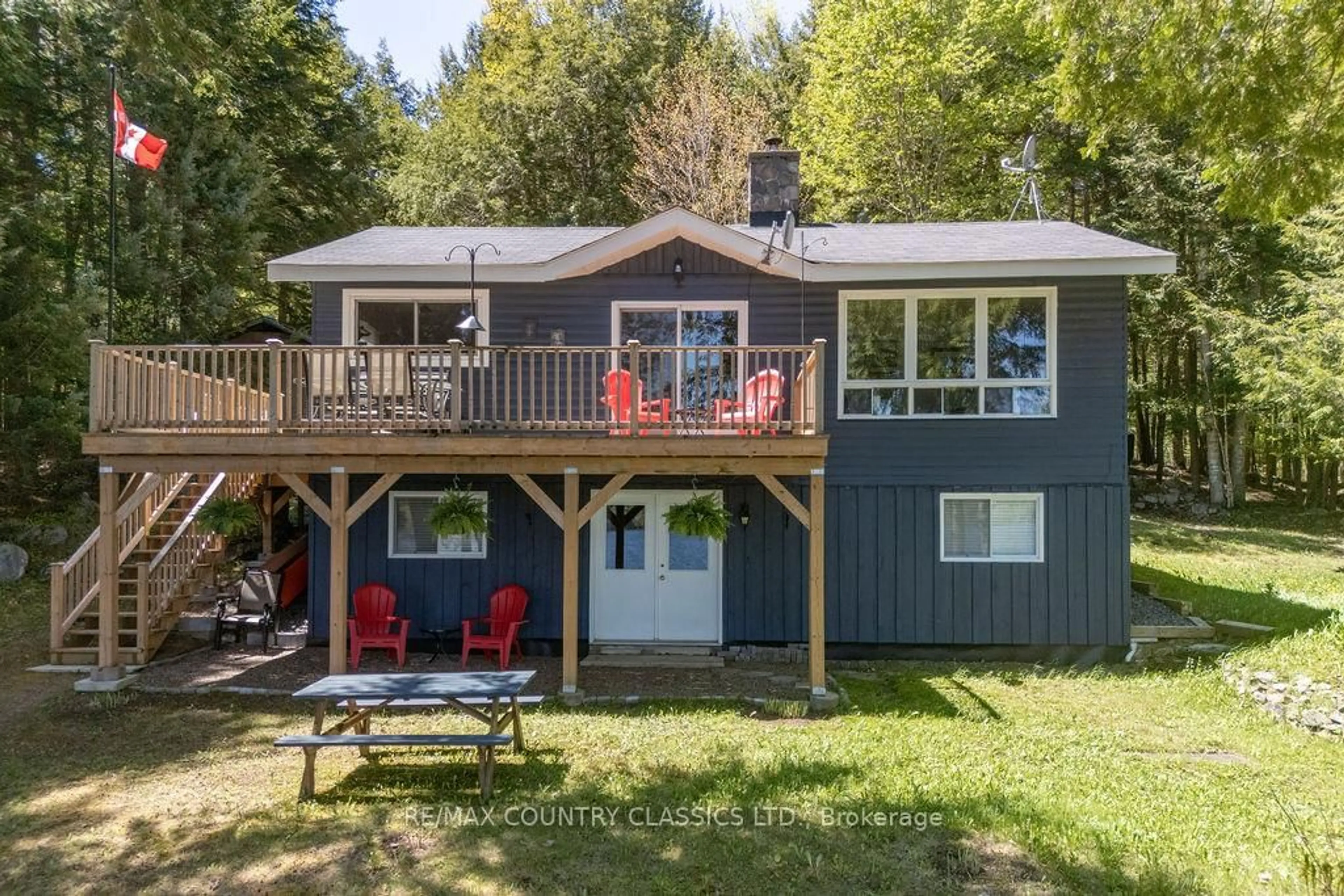 A pic from outside/outdoor area/front of a property/back of a property/a pic from drone, water/lake/river/ocean view for 1650B River Rd, Barry's Bay Ontario K0J 1B0