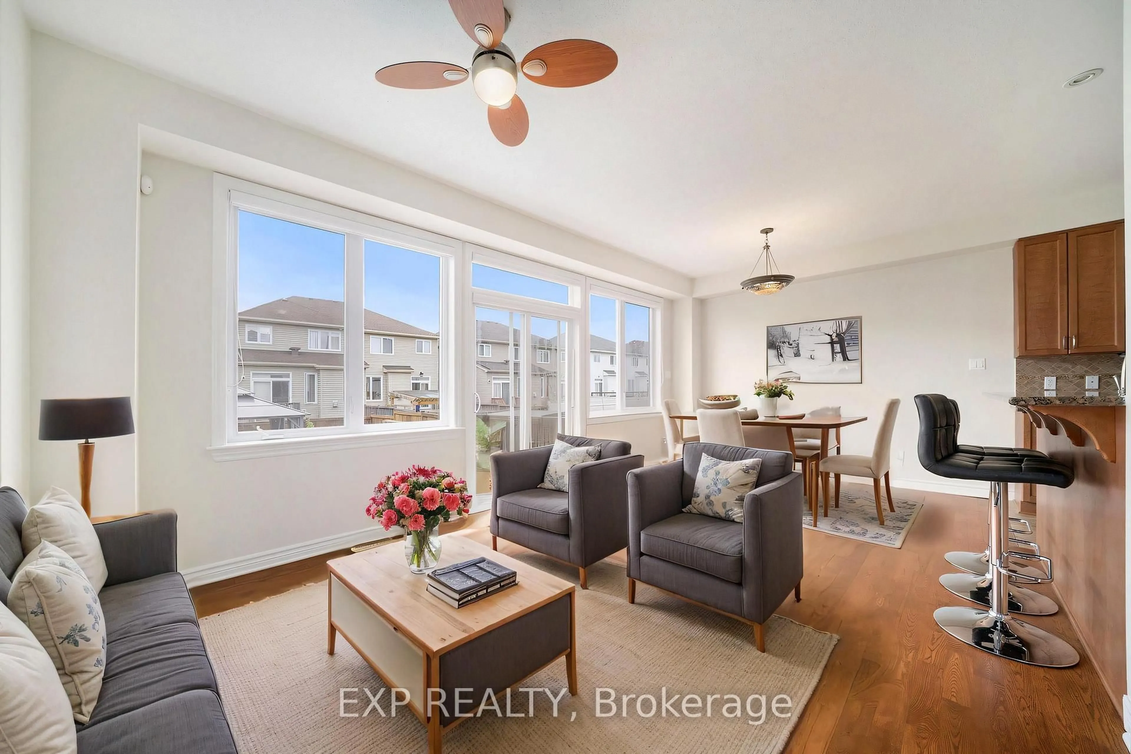 Living room with furniture, wood/laminate floor for 318 Kippen Pl, Ottawa Ontario K2J 0N8