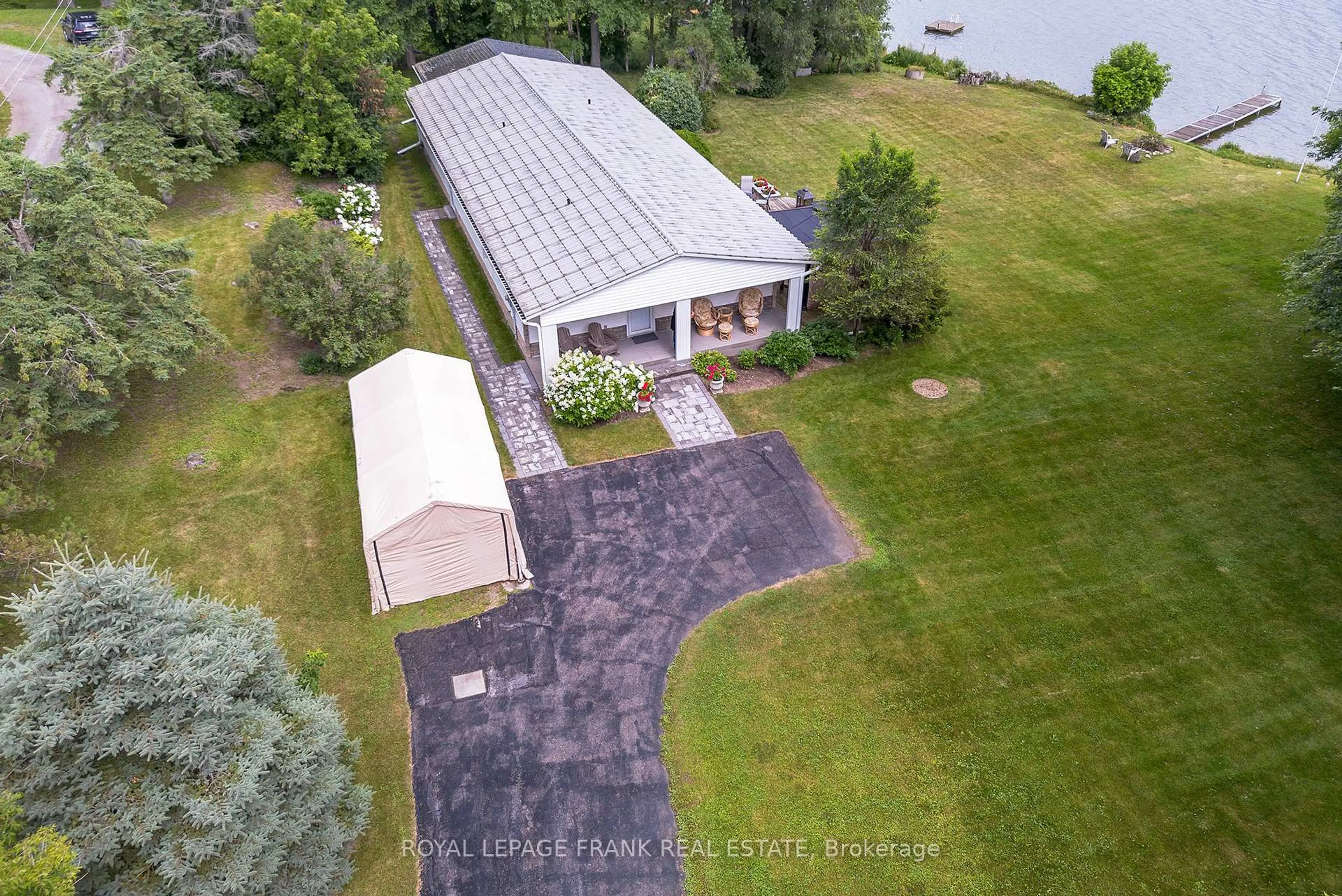 A pic from outside/outdoor area/front of a property/back of a property/a pic from drone, water/lake/river/ocean view for 46 LAKEVIEW Blvd, Kawartha Lakes Ontario K0M 2C0