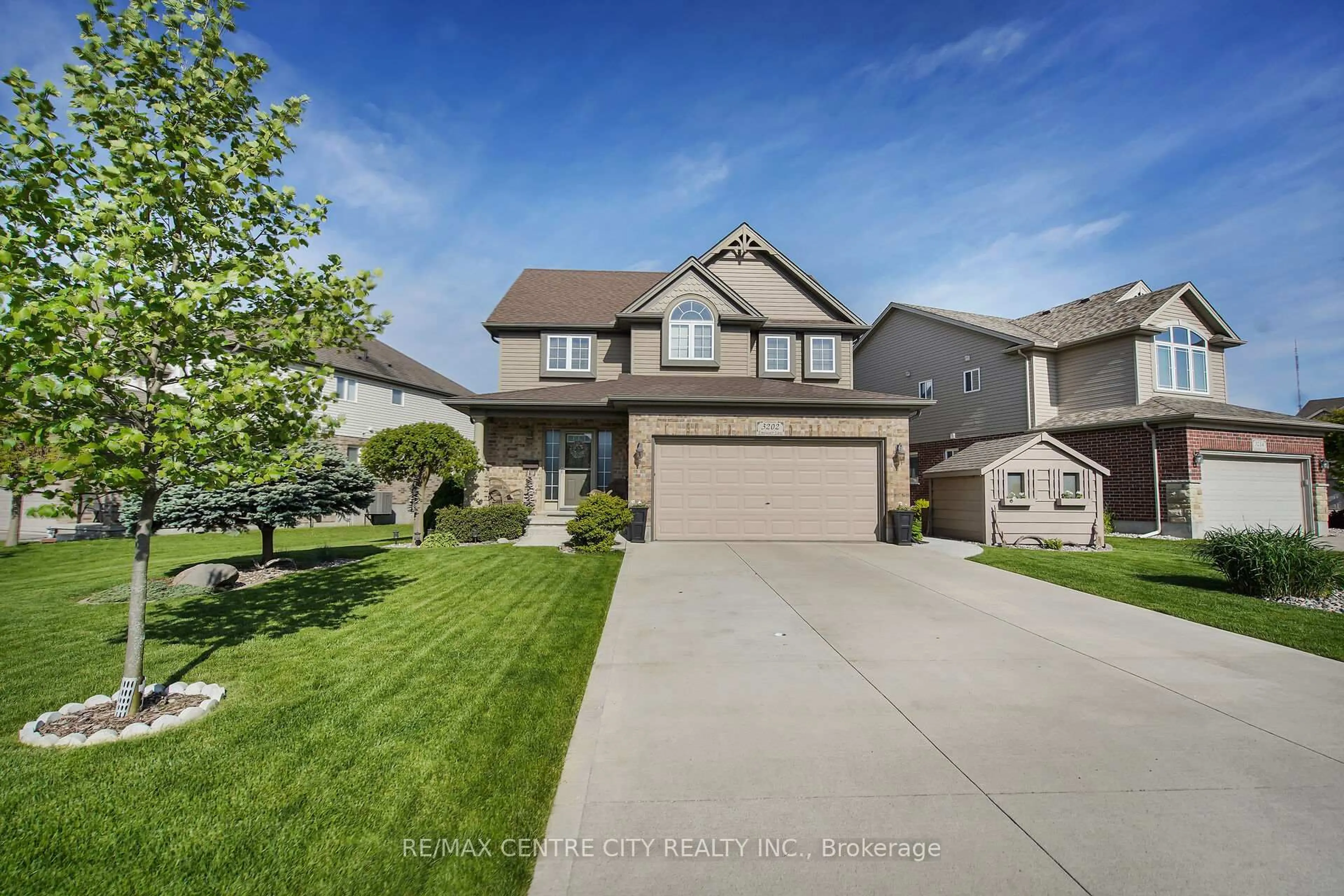 A pic from outside/outdoor area/front of a property/back of a property/a pic from drone, street for 3202 Emilycarr Lane, London South Ontario N6L 0B2