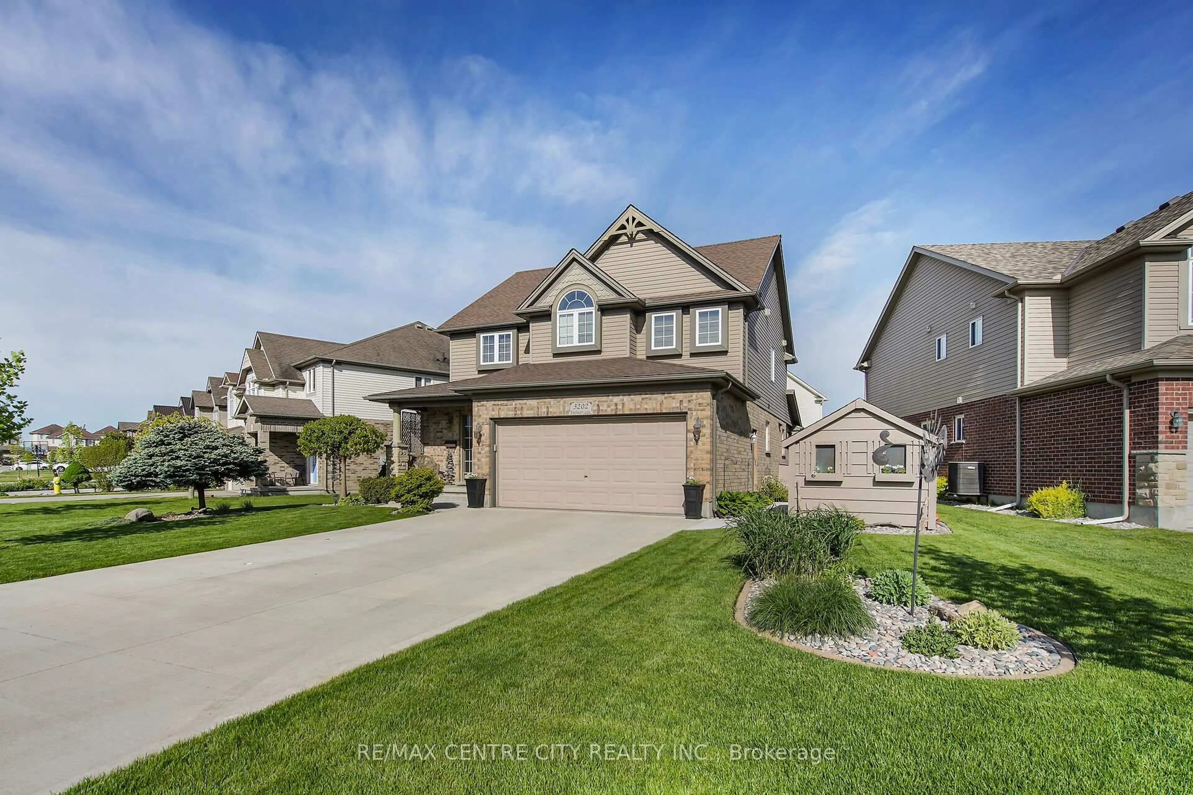 Home with vinyl exterior material, street for 3202 Emilycarr Lane, London South Ontario N6L 0B2