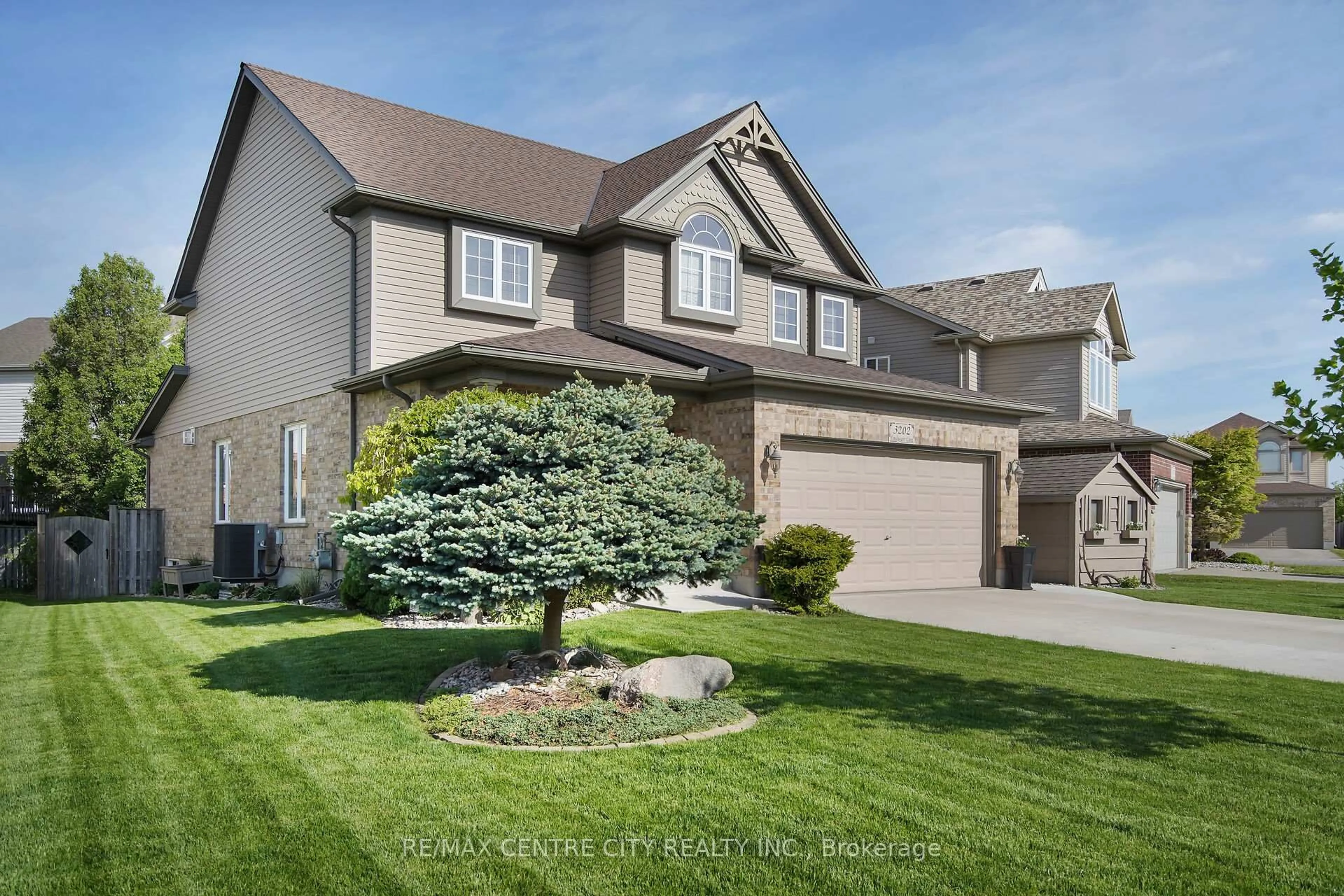 Home with vinyl exterior material, street for 3202 Emilycarr Lane, London South Ontario N6L 0B2