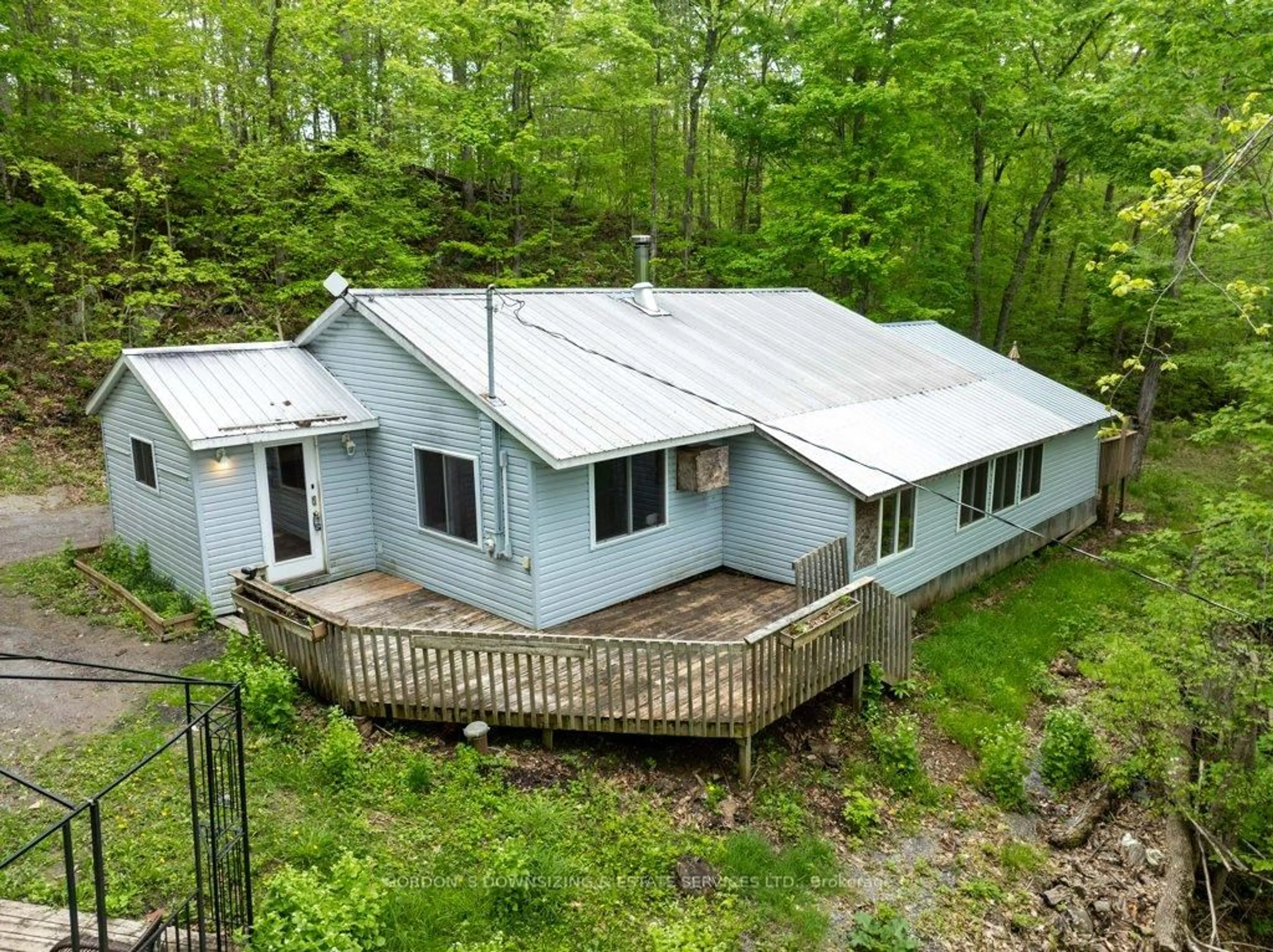 A pic from outside/outdoor area/front of a property/back of a property/a pic from drone, forest/trees view for 257 Westall Lane, Tweed Ontario N1A 2W1