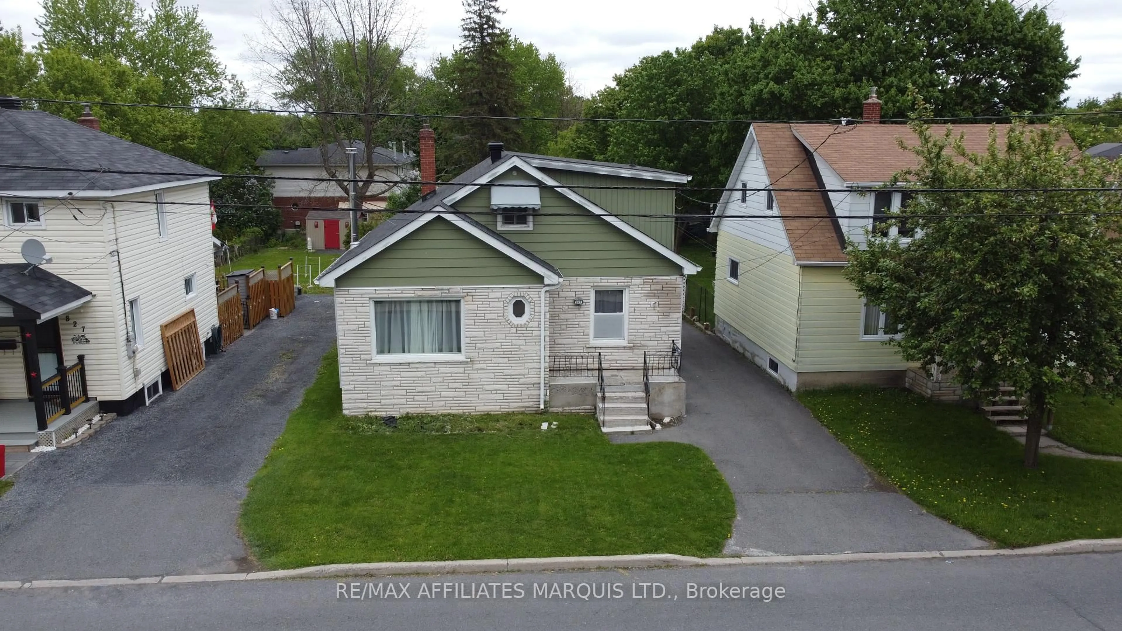 A pic from outside/outdoor area/front of a property/back of a property/a pic from drone, street for 823 Amelia St, Cornwall Ontario K6H 3R5