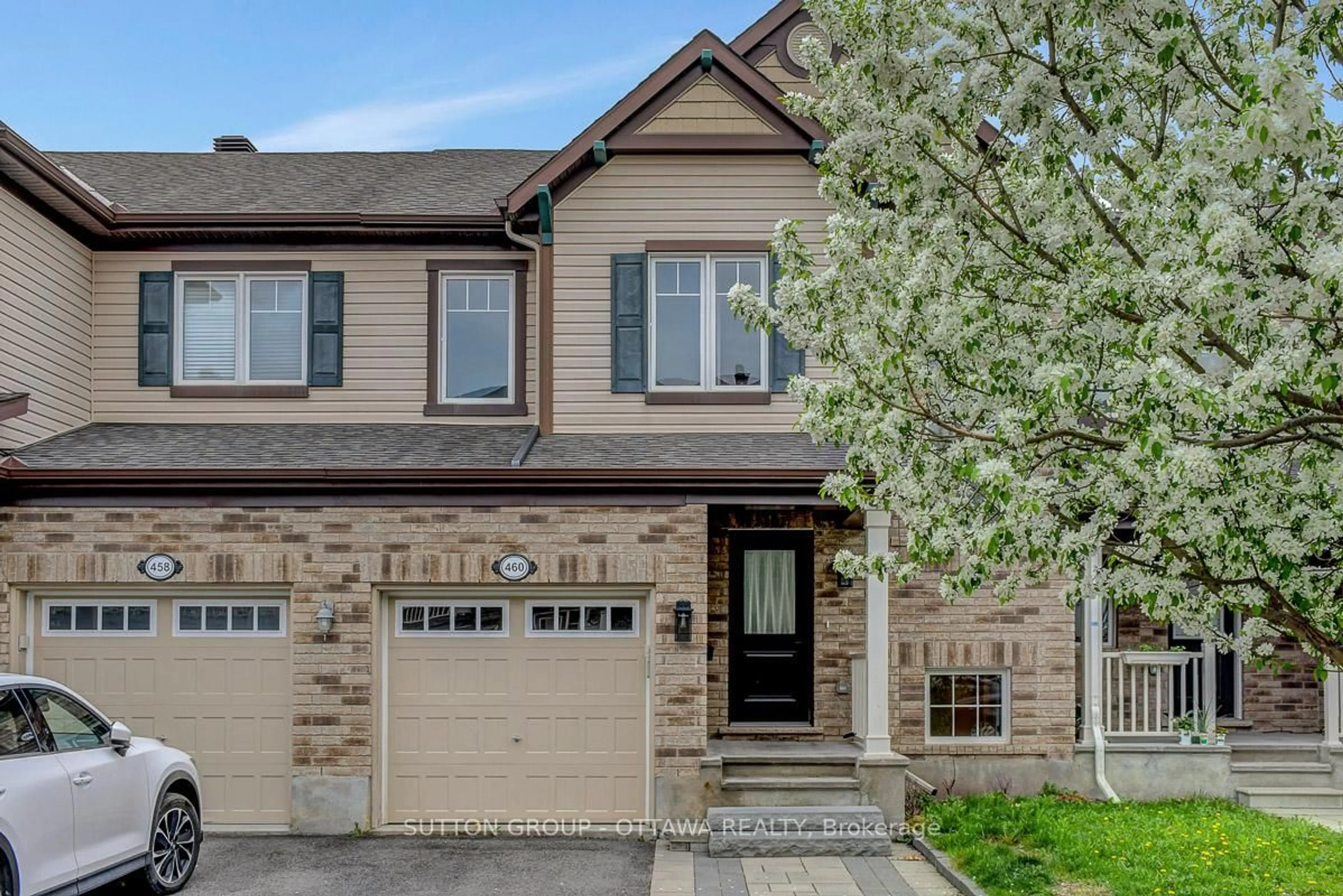 Home with brick exterior material, street for 460 Meadowhawk Cres, Ottawa Ontario K2J 5W8