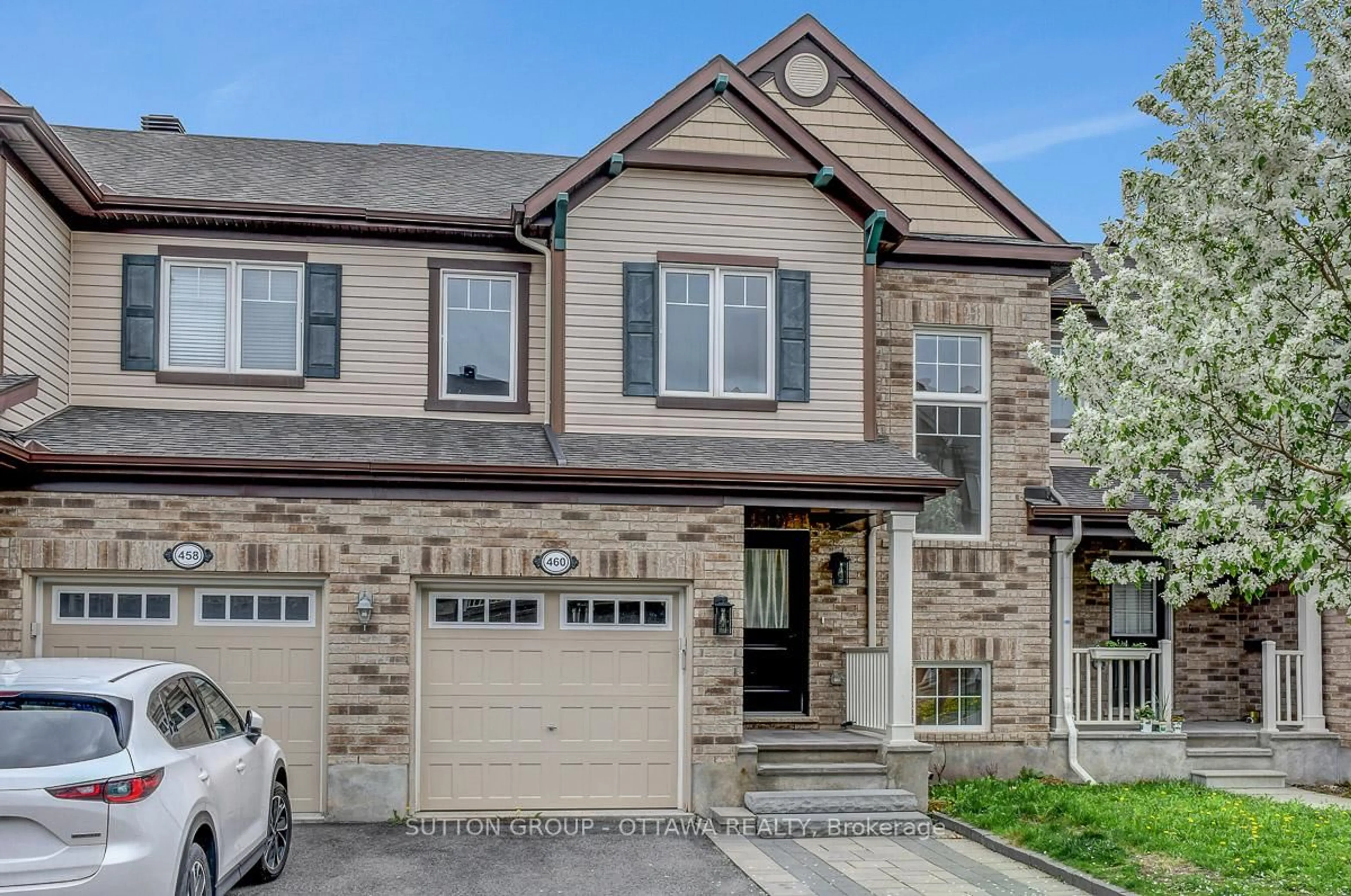 Home with brick exterior material, street for 460 Meadowhawk Cres, Ottawa Ontario K2J 5W8