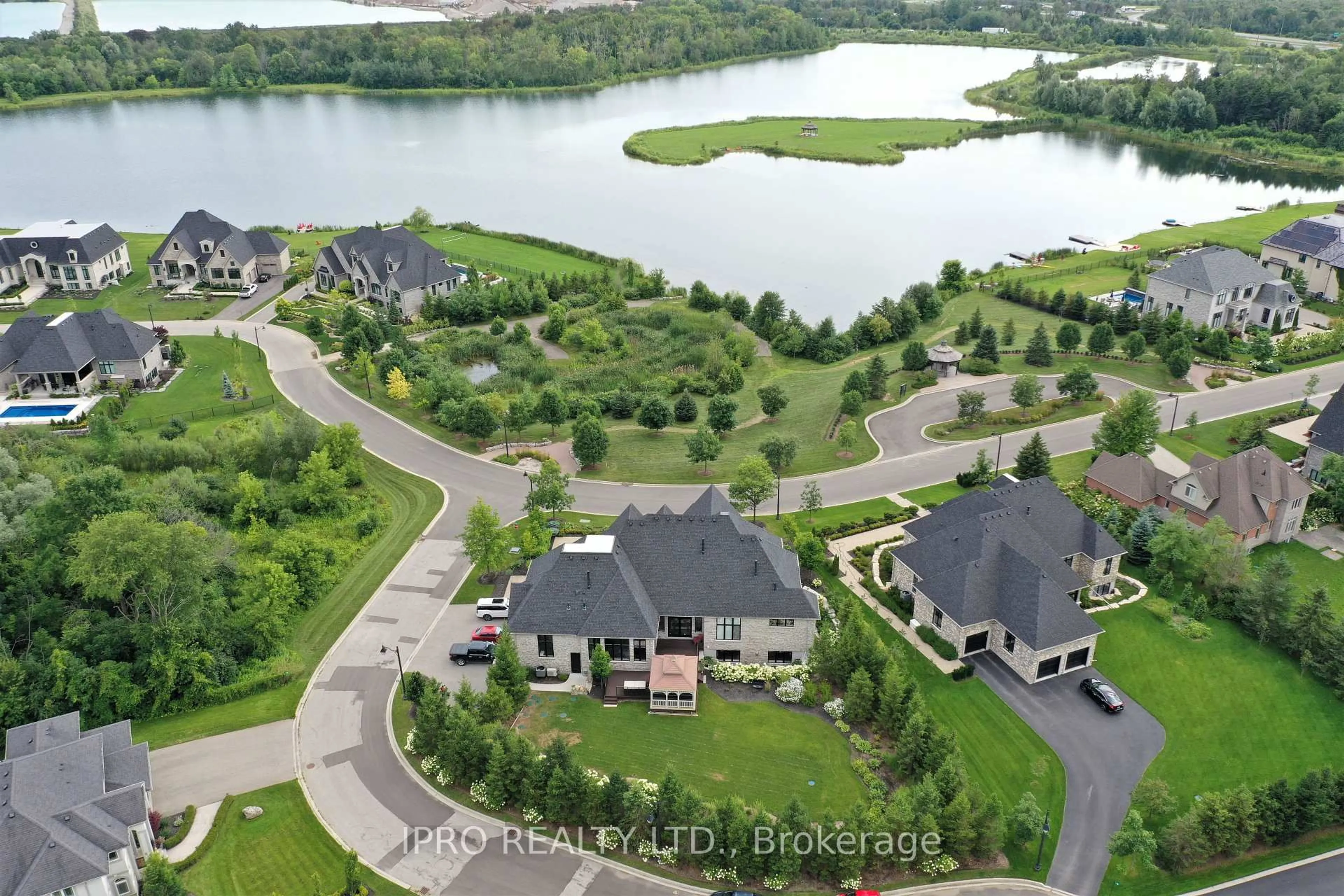 A pic from outside/outdoor area/front of a property/back of a property/a pic from drone, water/lake/river/ocean view for 11 Lambeth Lane #45, Puslinch Ontario N0B 2J0