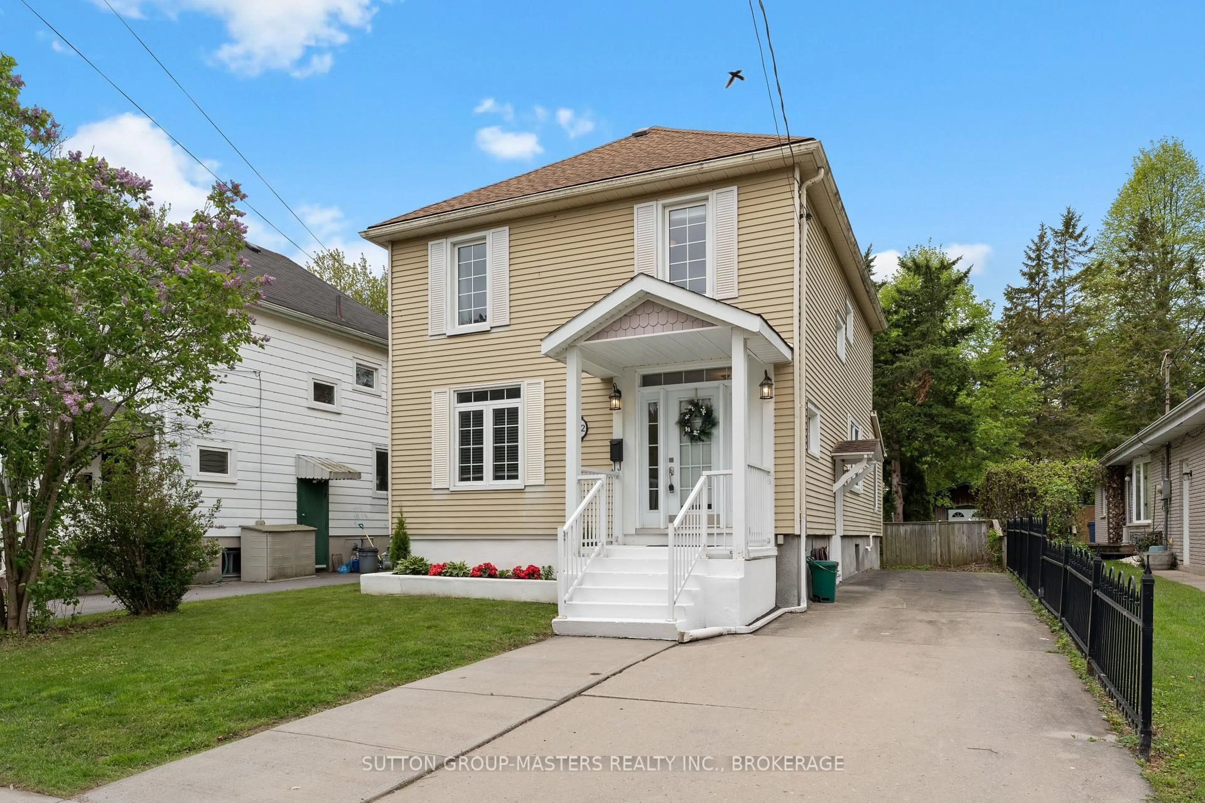 Home with vinyl exterior material, street for 52 Pembroke St, Kingston Ontario K7L 4N4