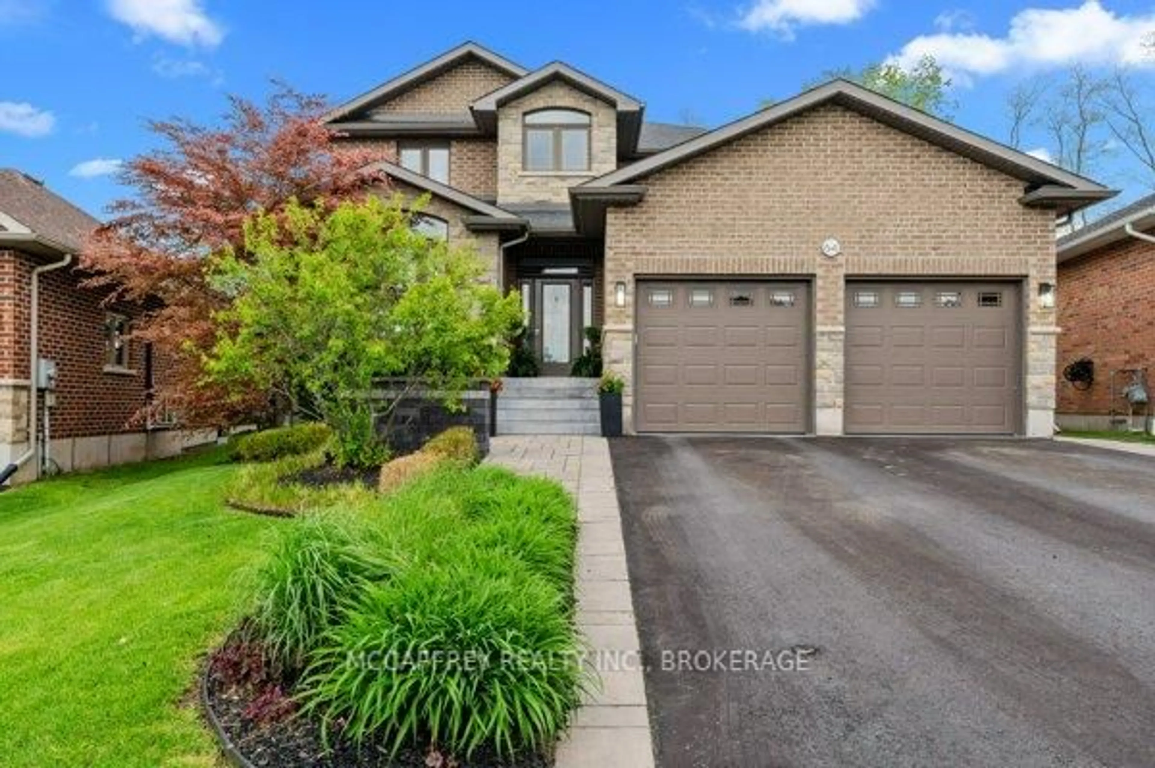 Home with brick exterior material, street for 64 Ashwood Cres, Greater Napanee Ontario K7R 0B1