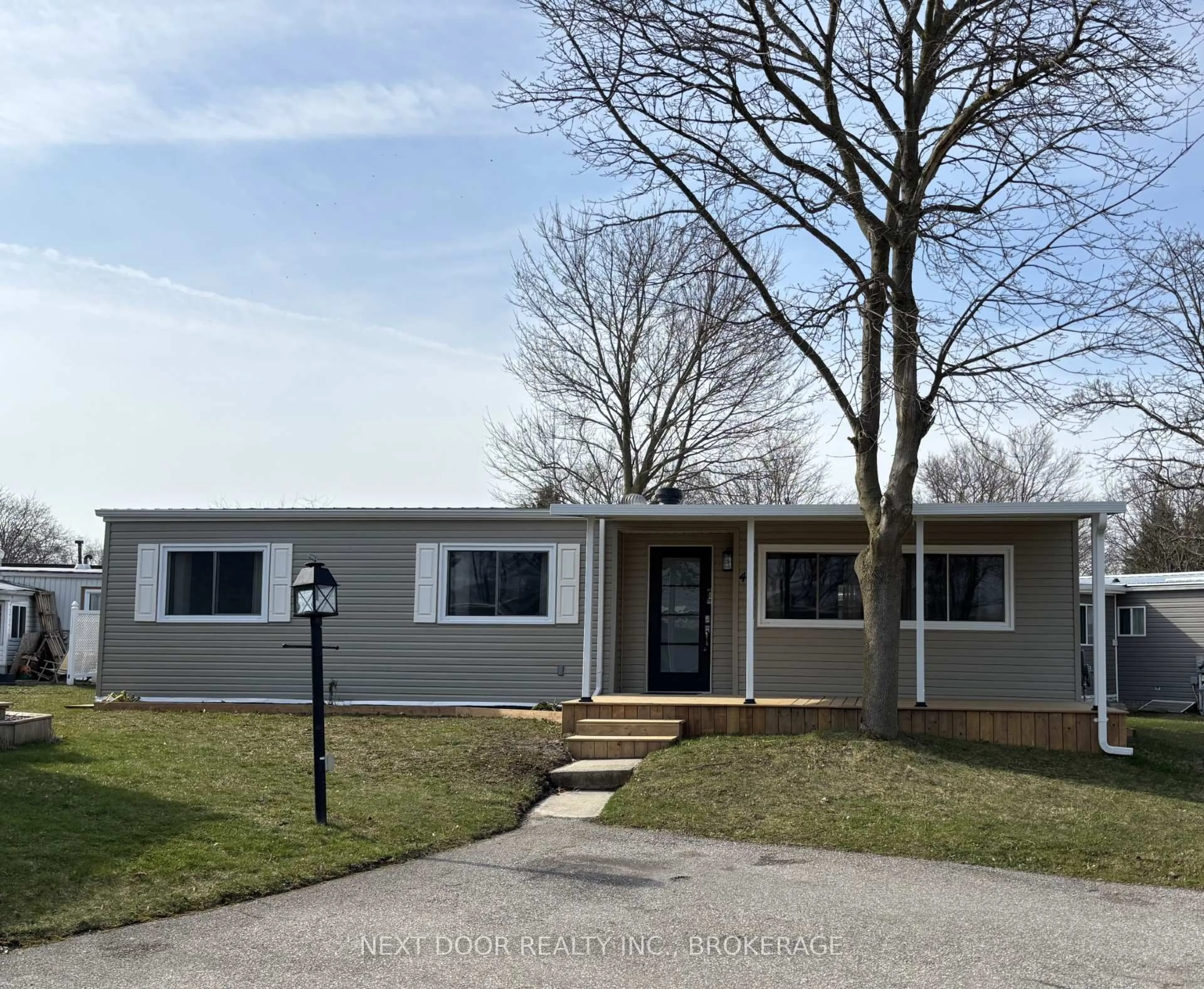 Home with vinyl exterior material, street for 46 St. Andrews Pl, South Huron Ontario N0M 1T0
