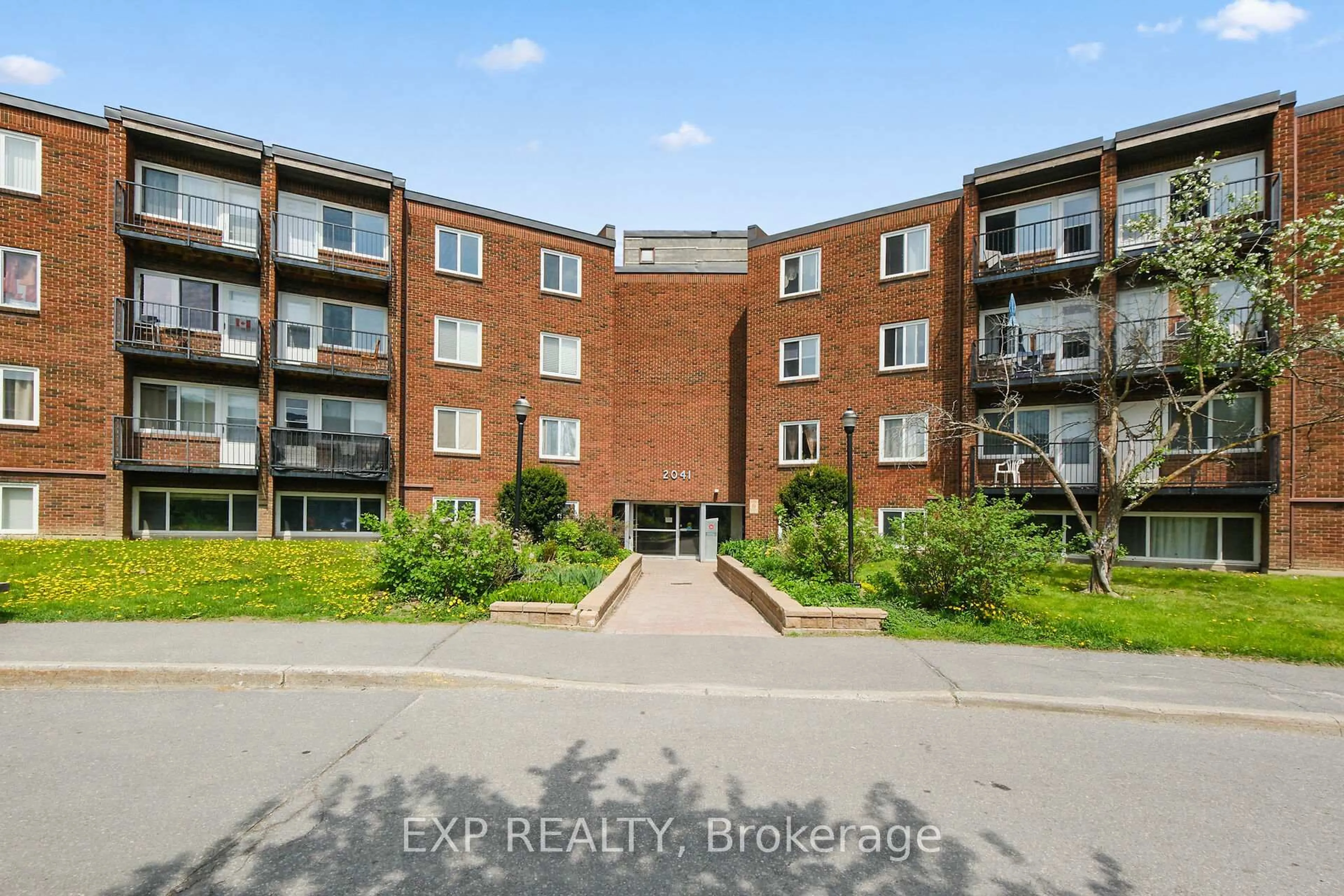 A pic from outside/outdoor area/front of a property/back of a property/a pic from drone, unknown for 2041 Arrowsmith Dr #305B, Ottawa Ontario K1J 7V7