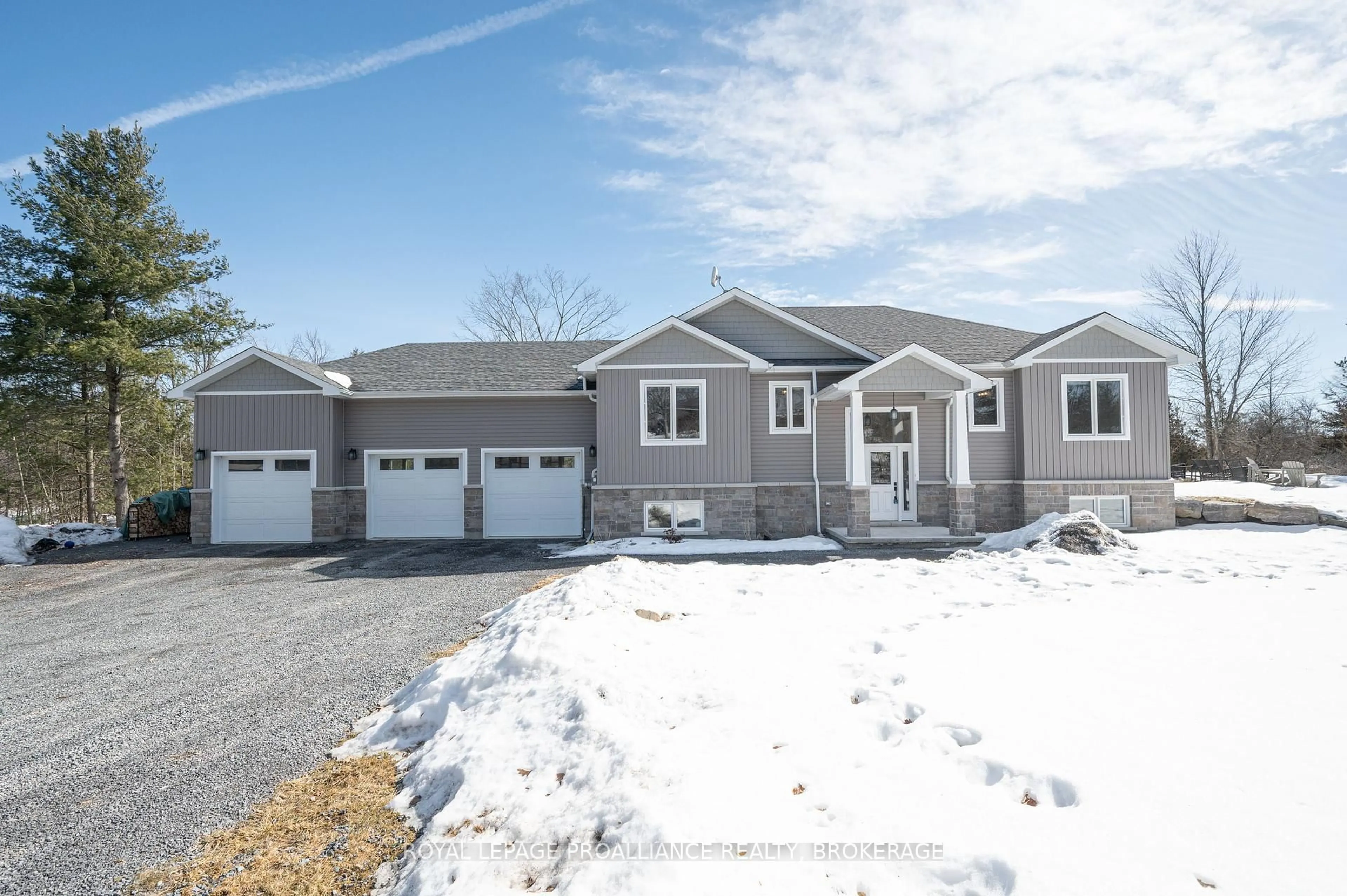 Home with vinyl exterior material, street for 12 Petworth Rd, Yarker Ontario K0K 3N0