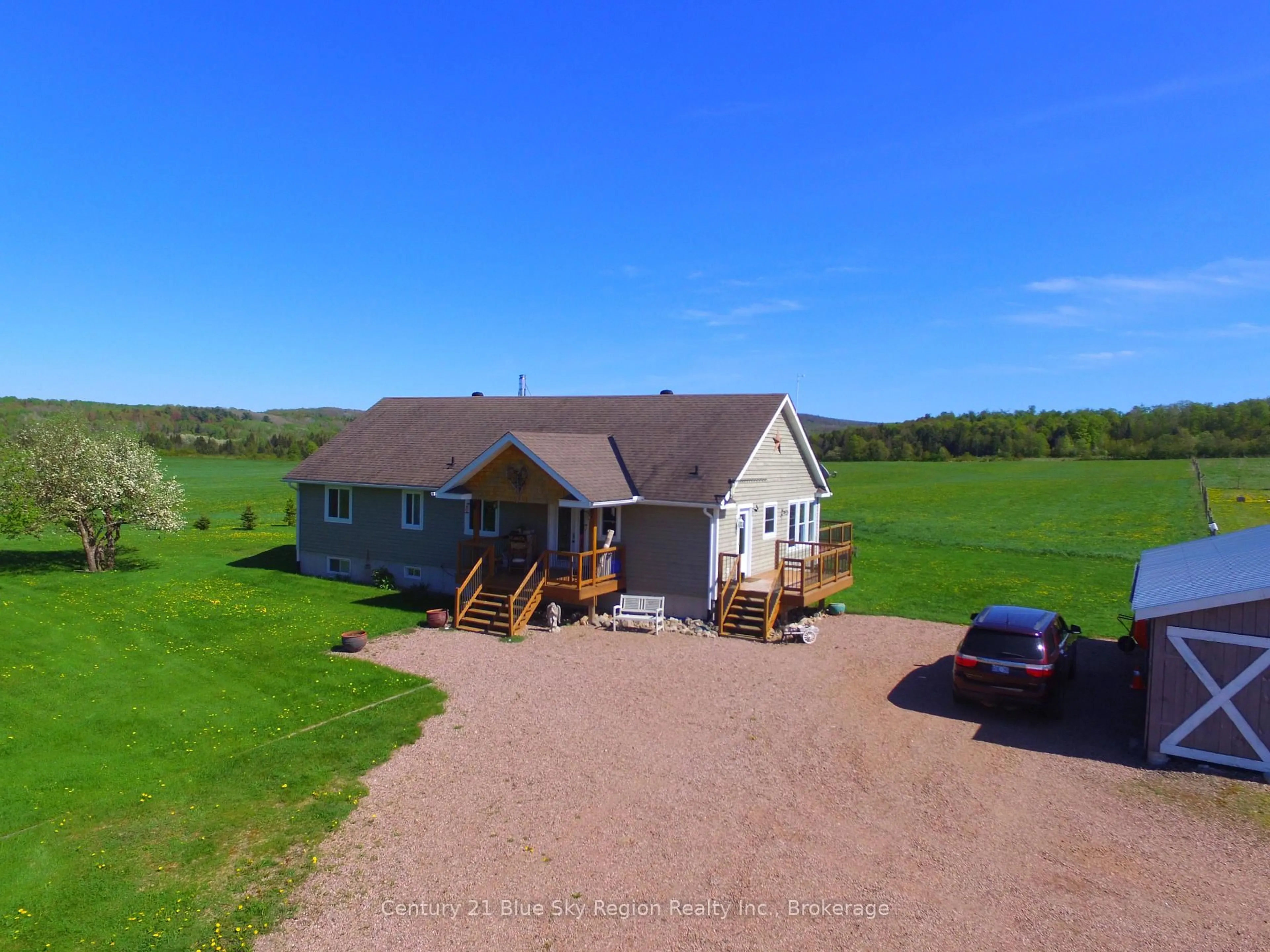 A pic from outside/outdoor area/front of a property/back of a property/a pic from drone, unknown for 167 English Line, Powassan Ontario P0H 1Z0