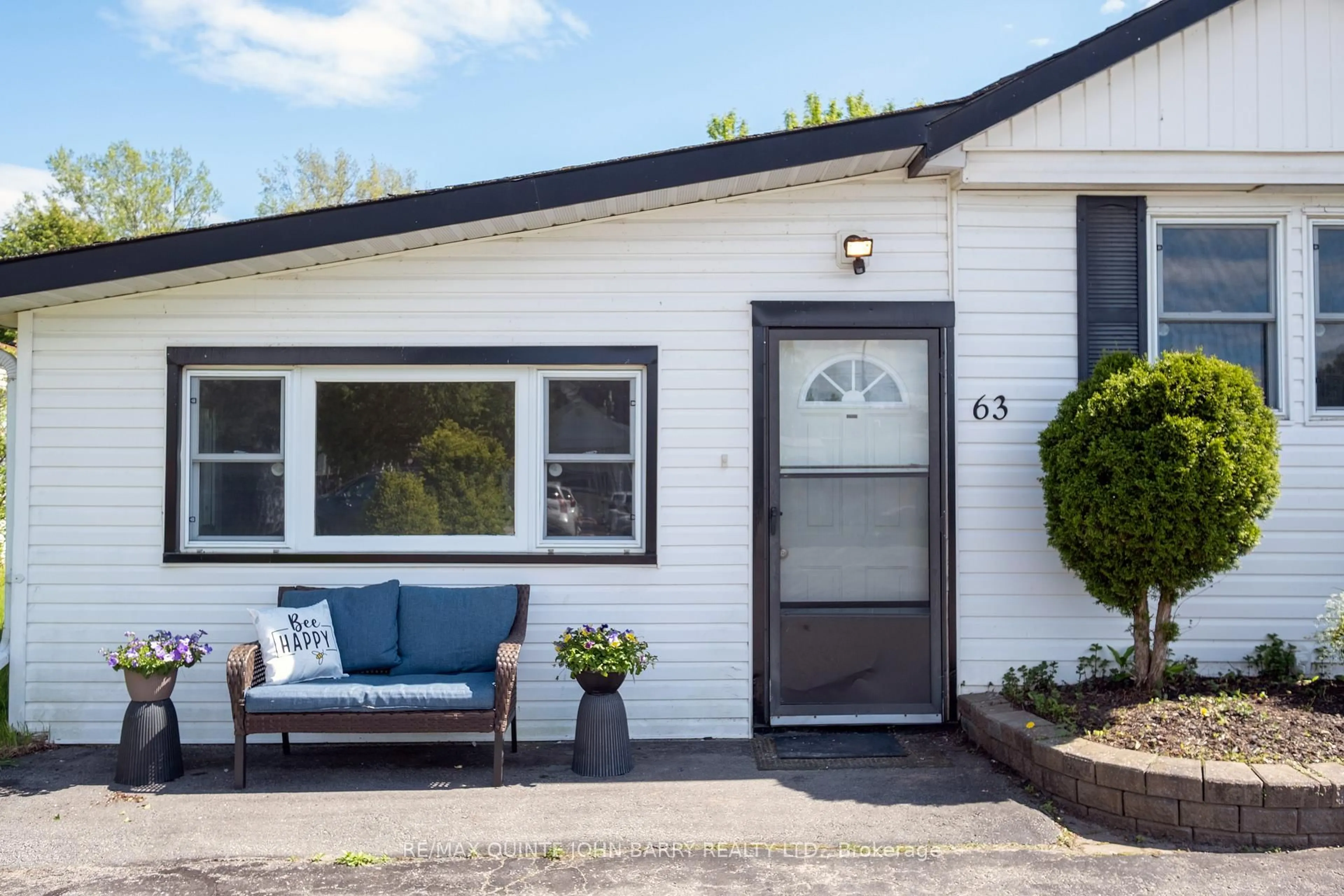 Home with vinyl exterior material, street for 63-529 Old Highway 2, Quinte West Ontario K8V 5P5