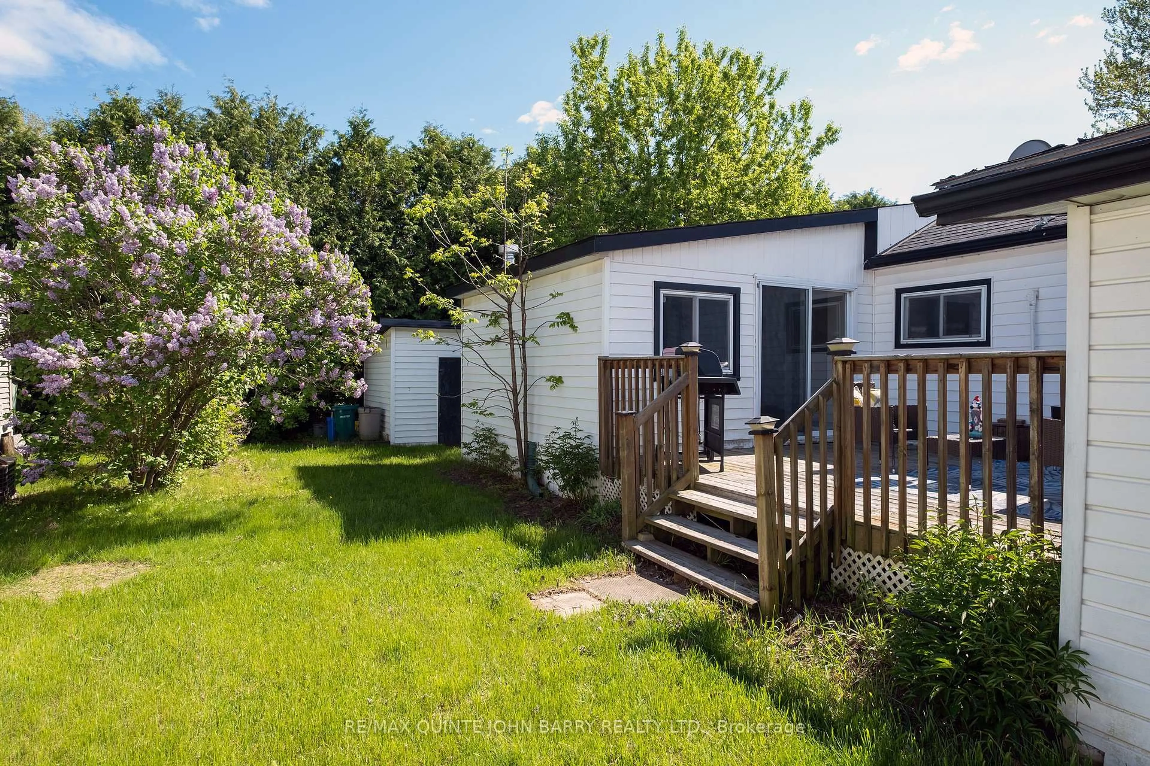 A pic from outside/outdoor area/front of a property/back of a property/a pic from drone, street for 63-529 Old Highway 2, Quinte West Ontario K8V 5P5