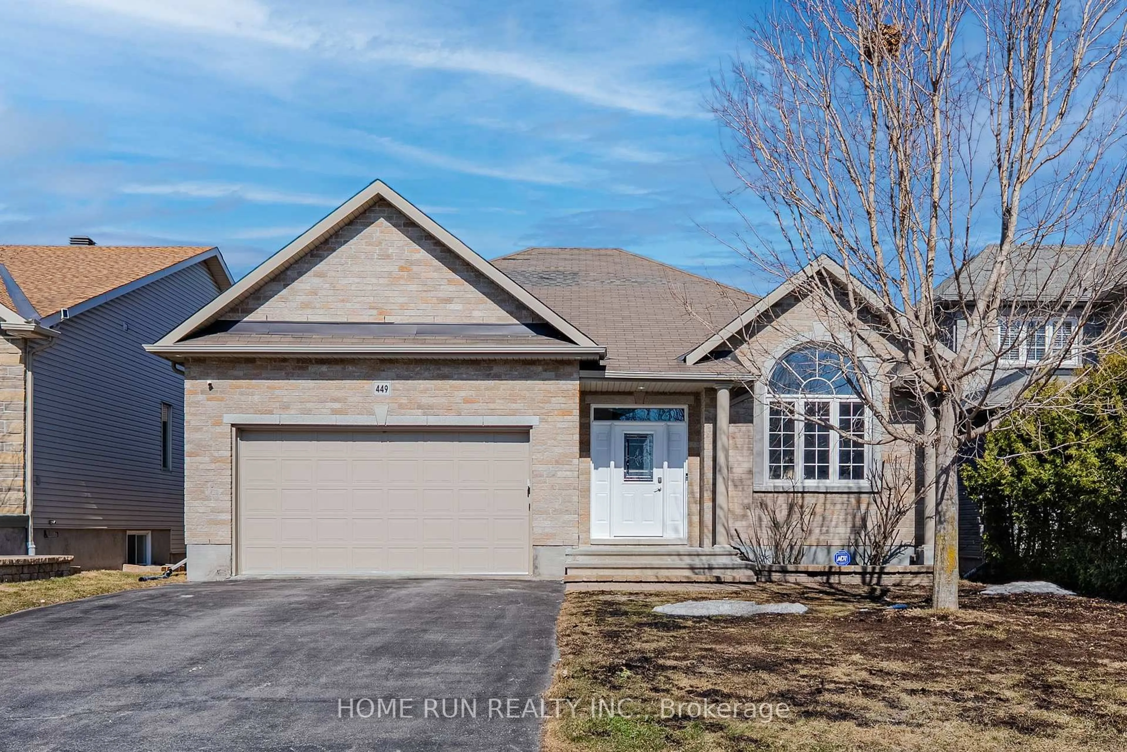 Home with brick exterior material, street for 449 Landswood Way, Ottawa Ontario K2S 0A4