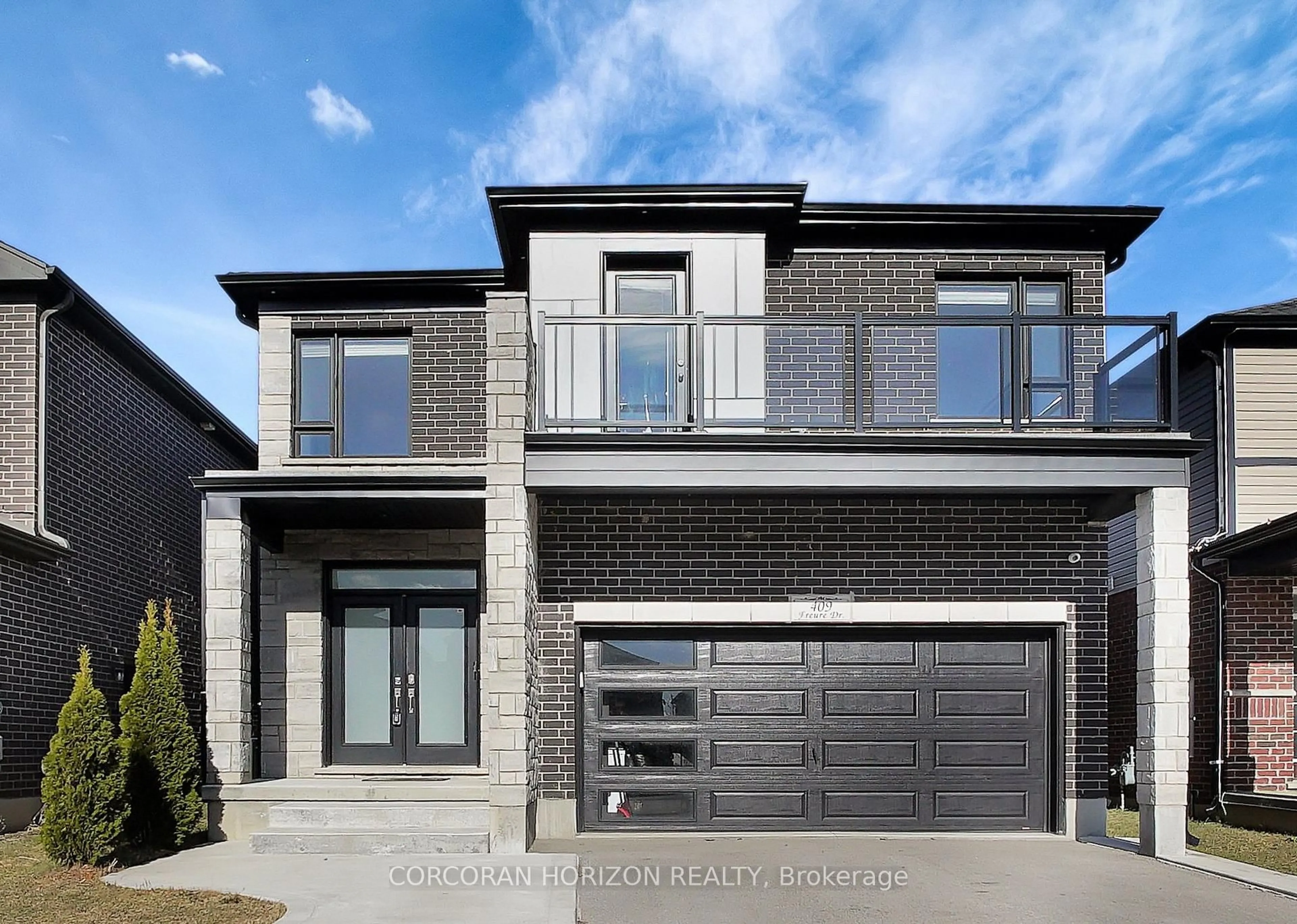 Home with brick exterior material, street for 409 Freure Dr, Cambridge Ontario N1S 0A2