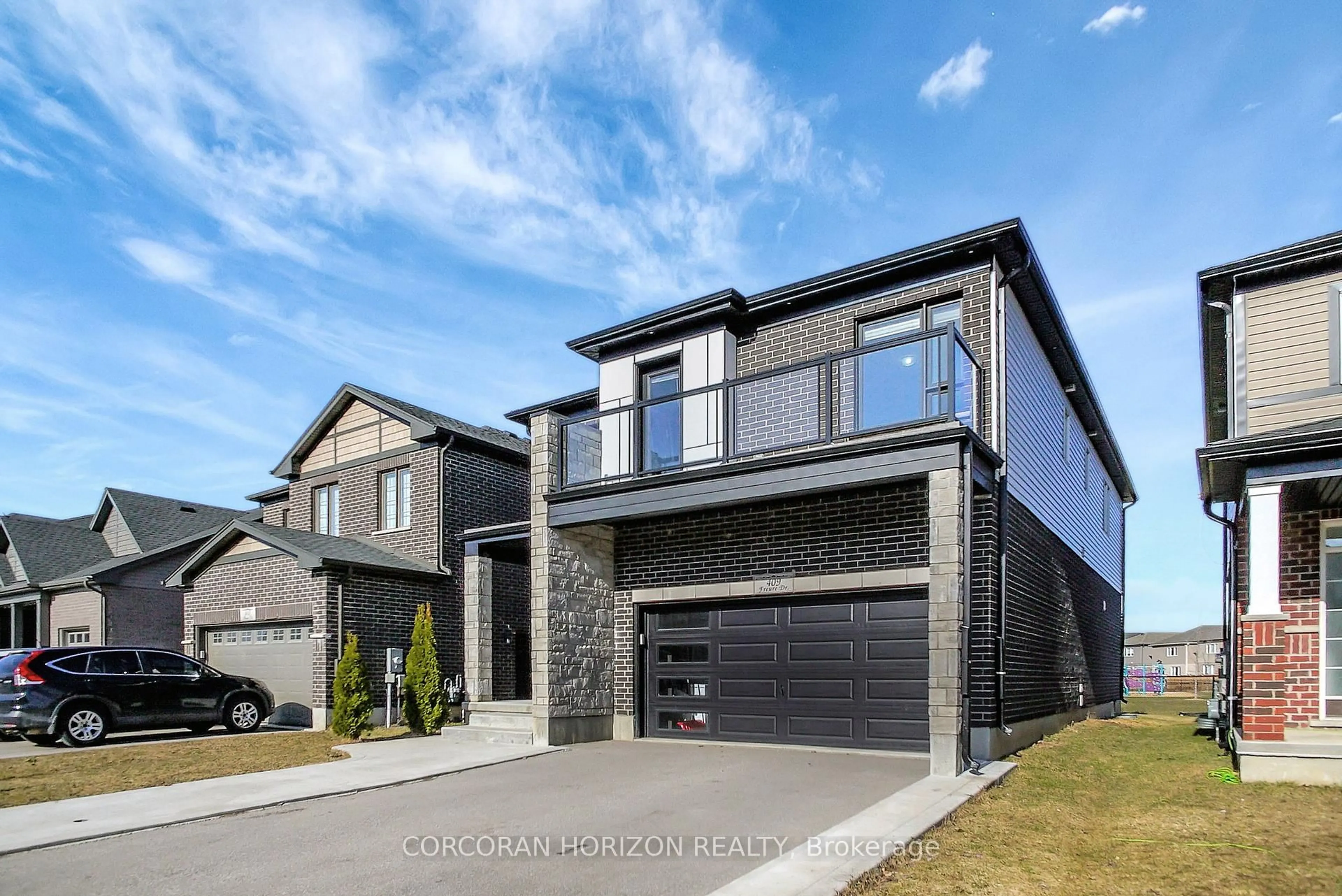 Home with brick exterior material, street for 409 Freure Dr, Cambridge Ontario N1S 0A2