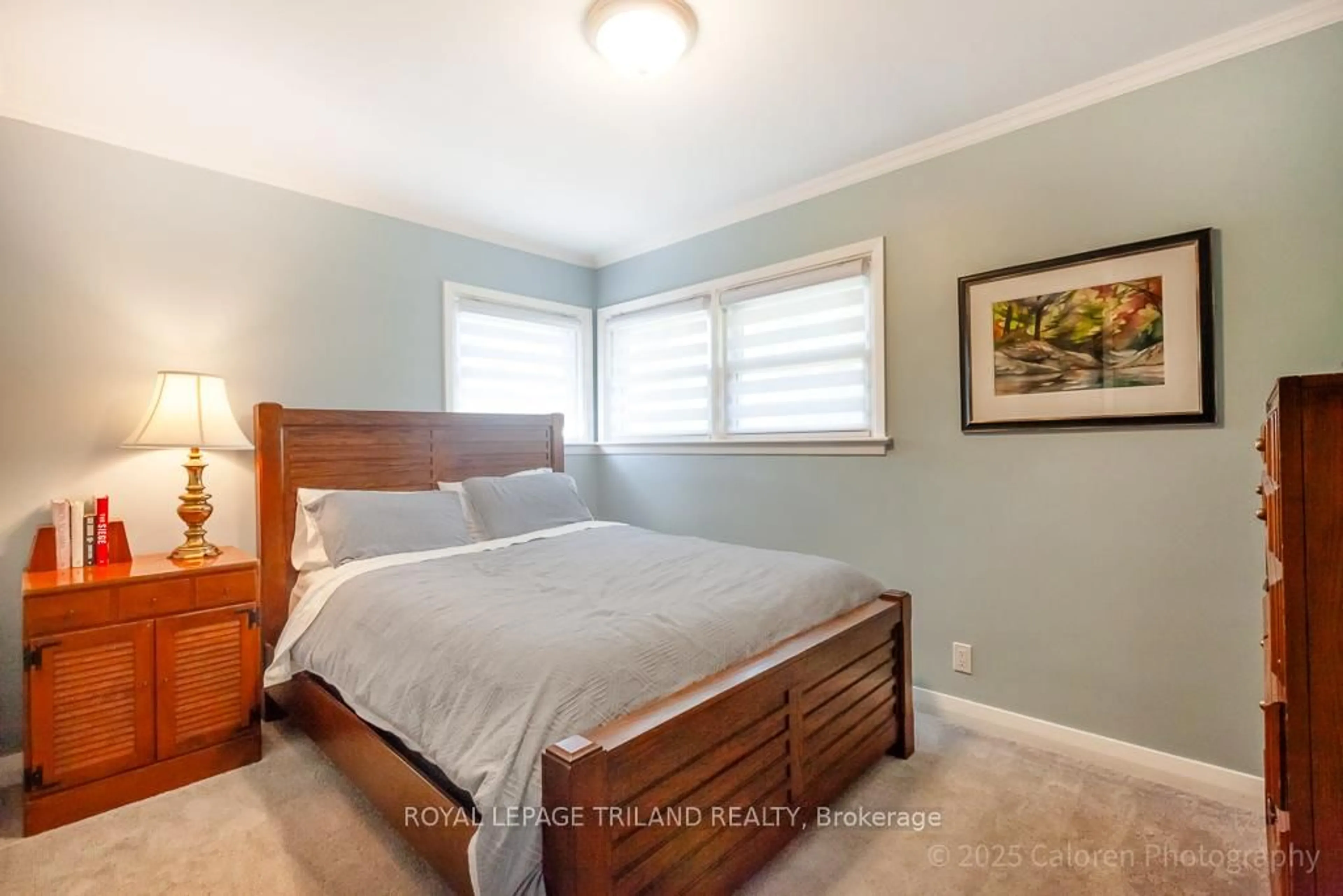 Bedroom with bed, wood/laminate floor for 1693 Moffatt Ave, London East Ontario N5W 2A2
