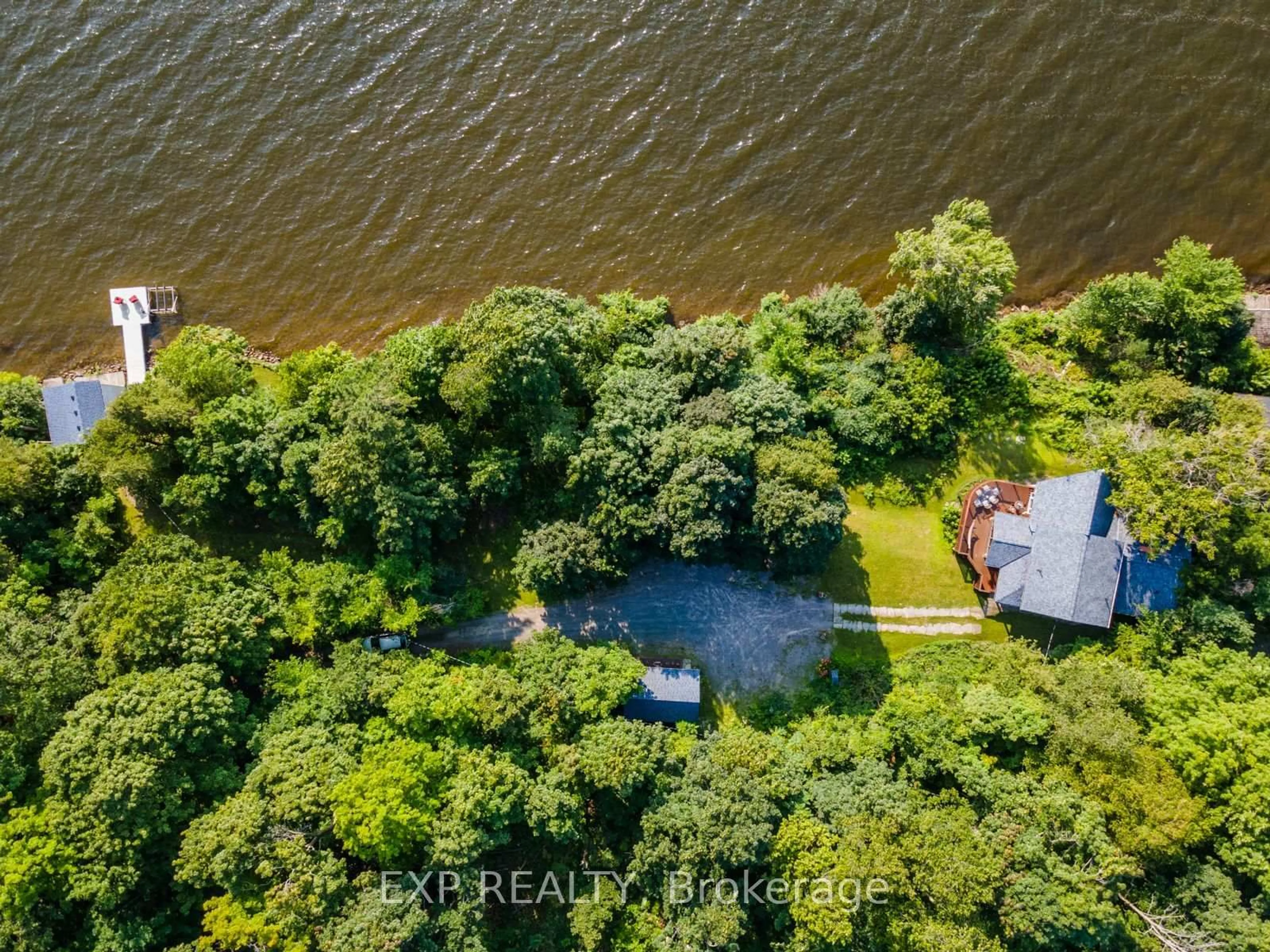 A pic from outside/outdoor area/front of a property/back of a property/a pic from drone, water/lake/river/ocean view for 7214 County Rd 18 #7, Alnwick/Haldimand Ontario K0K 2X0
