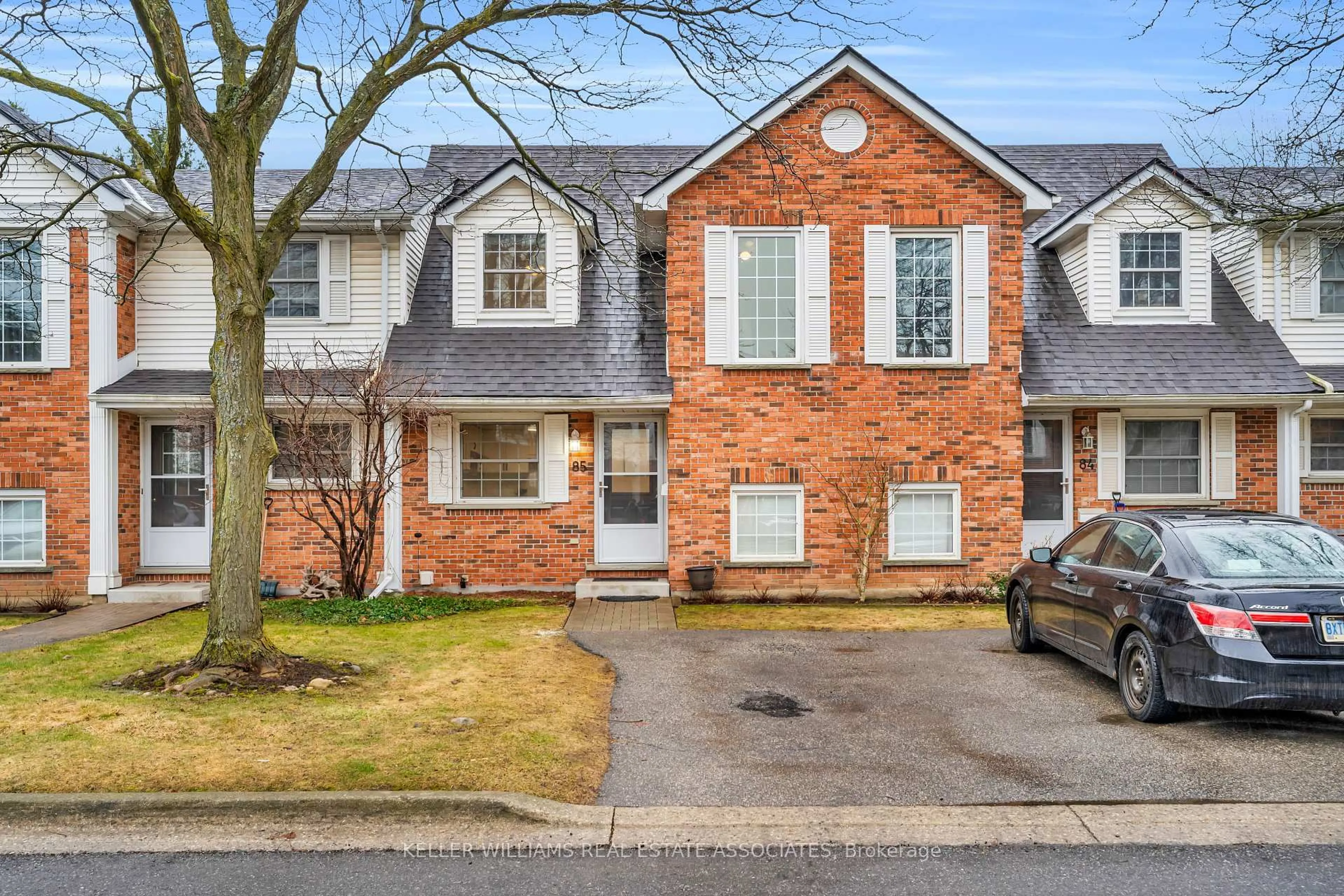 Home with brick exterior material, street for 129 Victoria Rd #85, Guelph Ontario N1E 6V4