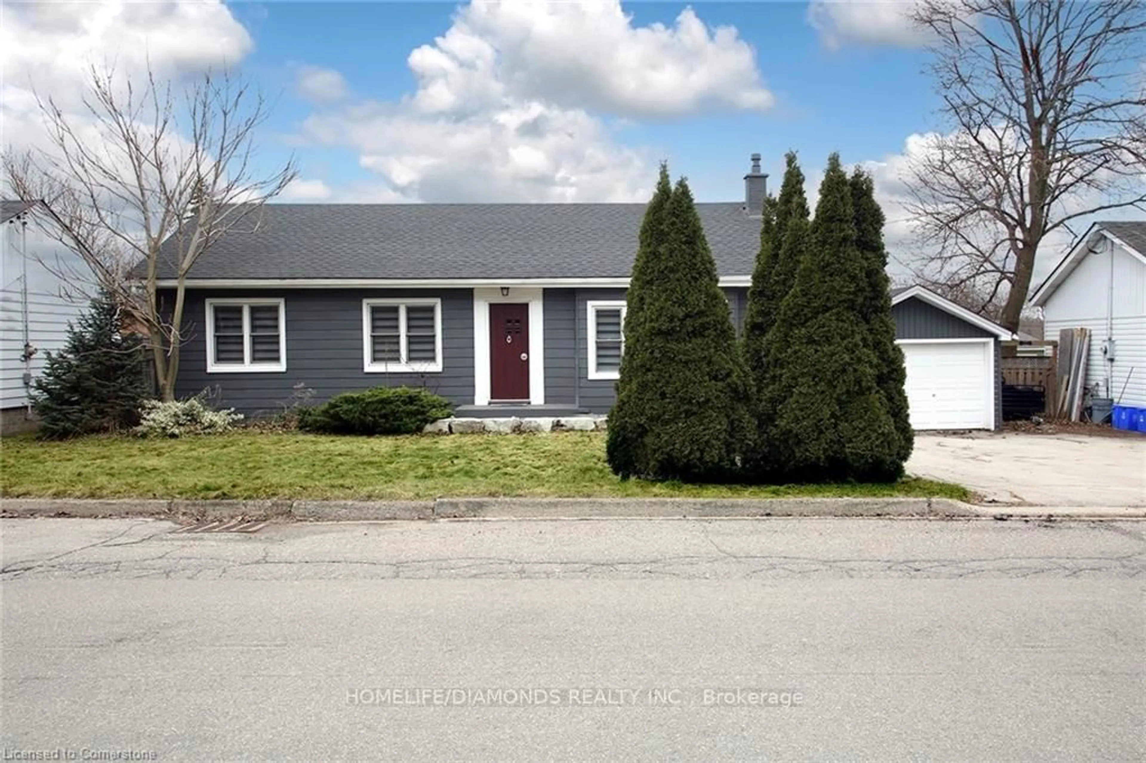 Home with vinyl exterior material, street for 15 First St, Hamilton Ontario L0R 2H0