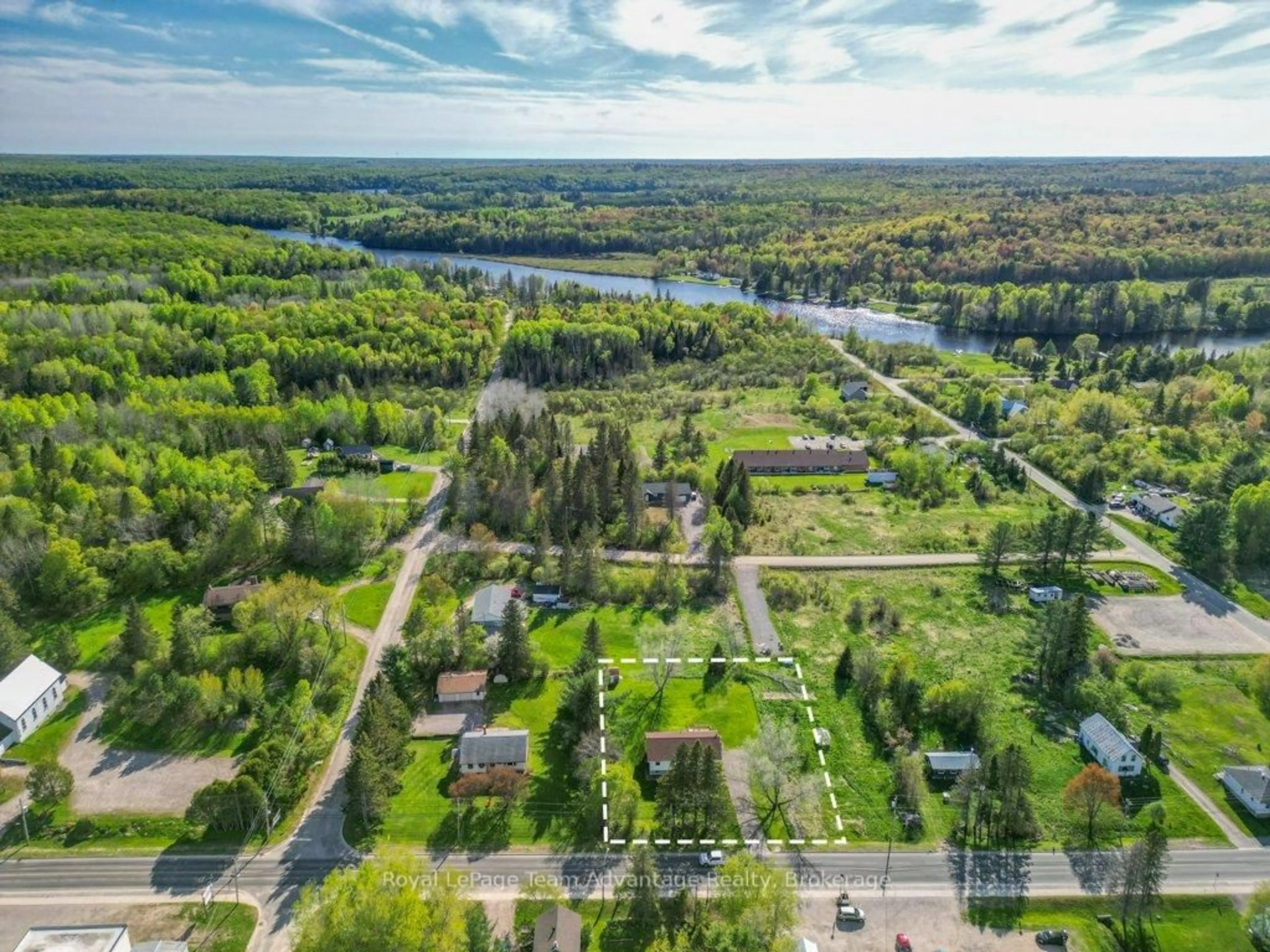 A pic from outside/outdoor area/front of a property/back of a property/a pic from drone, water/lake/river/ocean view for 56 South Sparks St, Magnetawan Ontario P0A 1P0