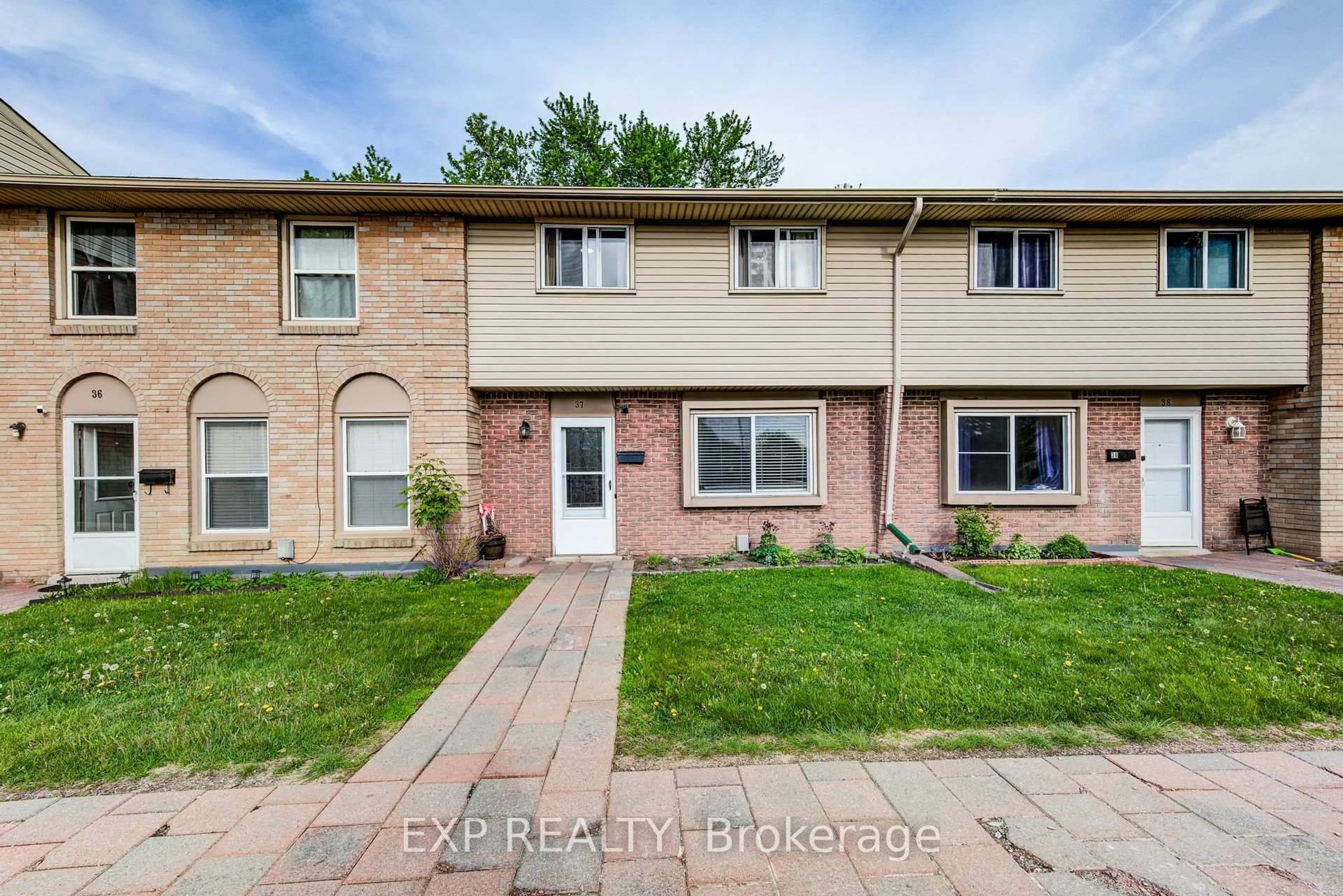 Home with brick exterior material, street for 293 Fairway Rd #37, Kitchener Ontario N2A 2P1
