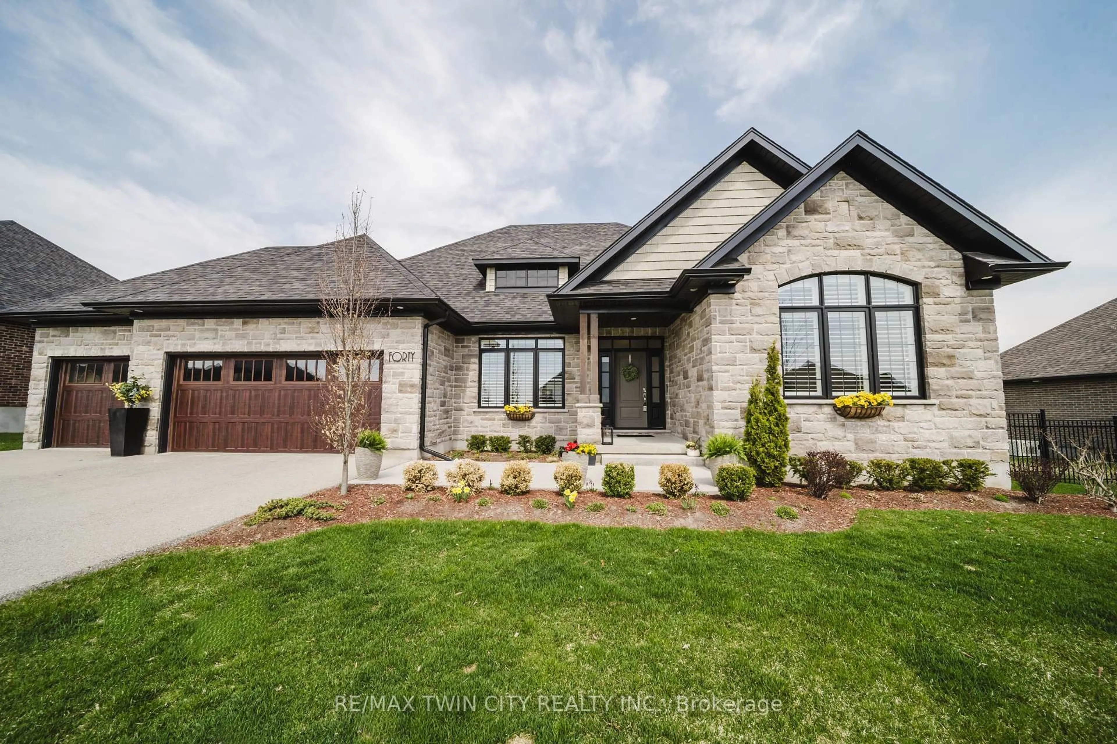 Home with brick exterior material, street for 40 Sunset Hills Cres, Woolwich Ontario N0B 2B0