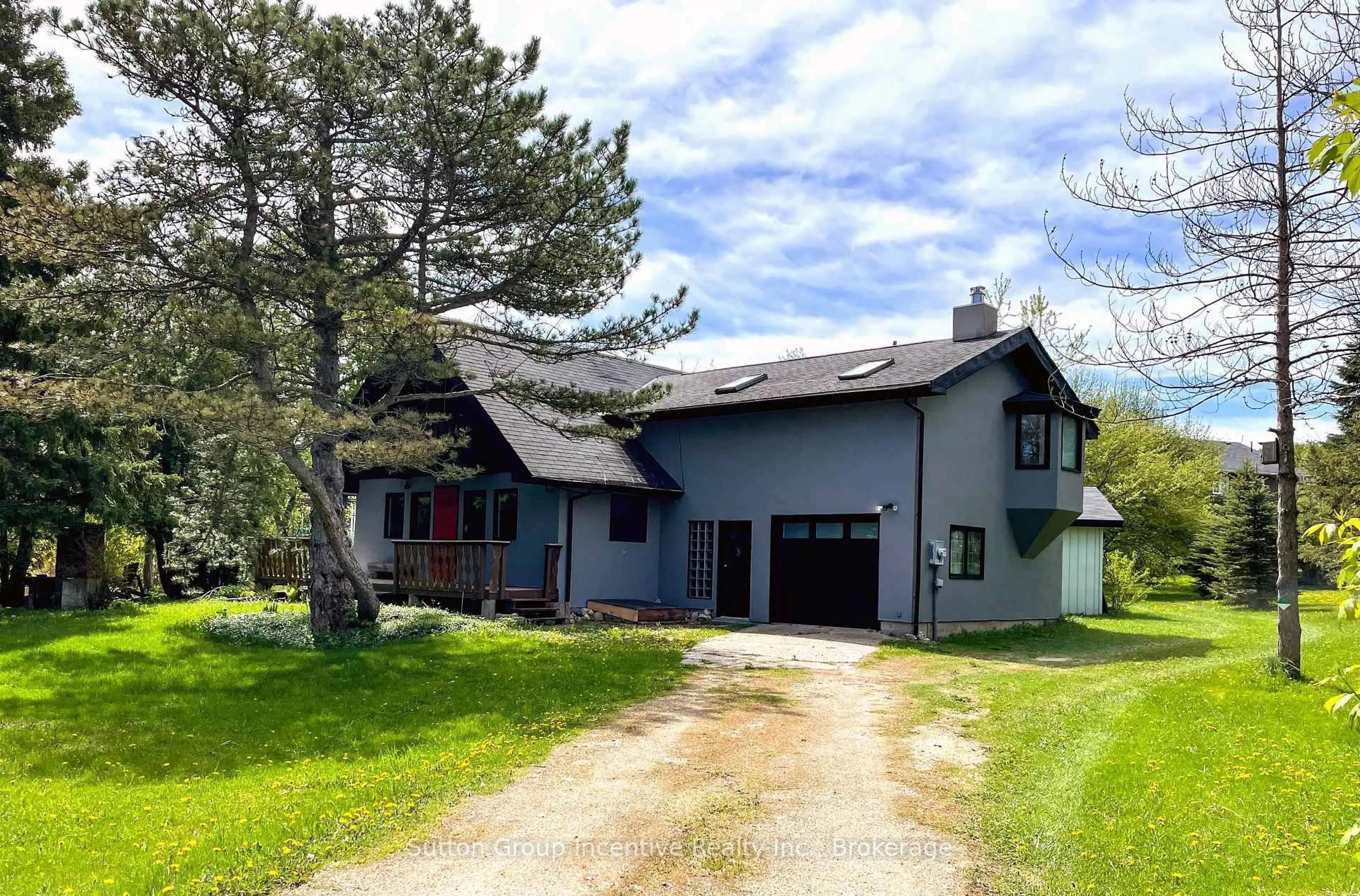 A pic from outside/outdoor area/front of a property/back of a property/a pic from drone, street for 114 Tyrol Ave, Blue Mountains Ontario N0H 2E0