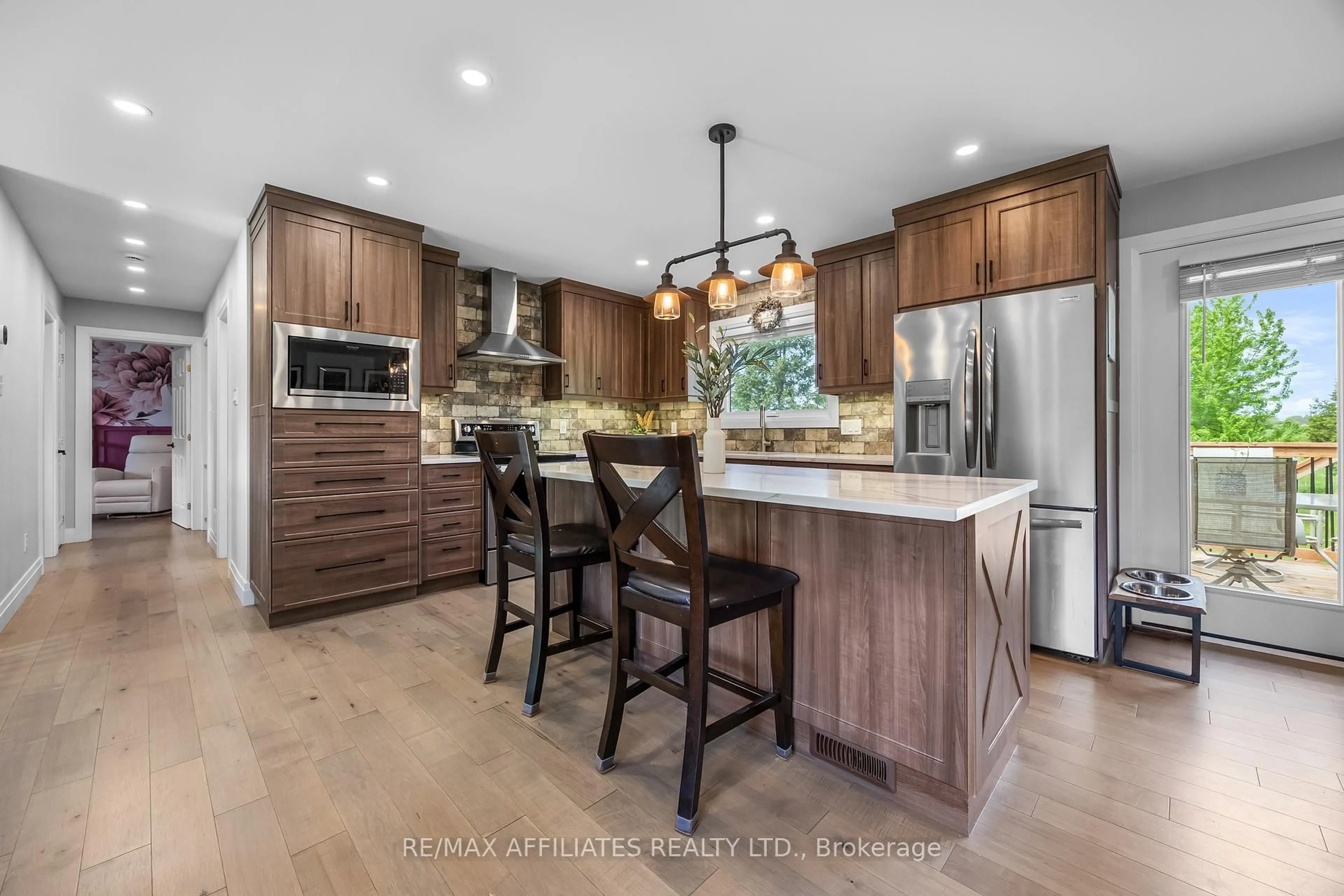Open concept kitchen, wood/laminate floor for 1478 Drummond 6b Concession, Perth Ontario K7H 3C8