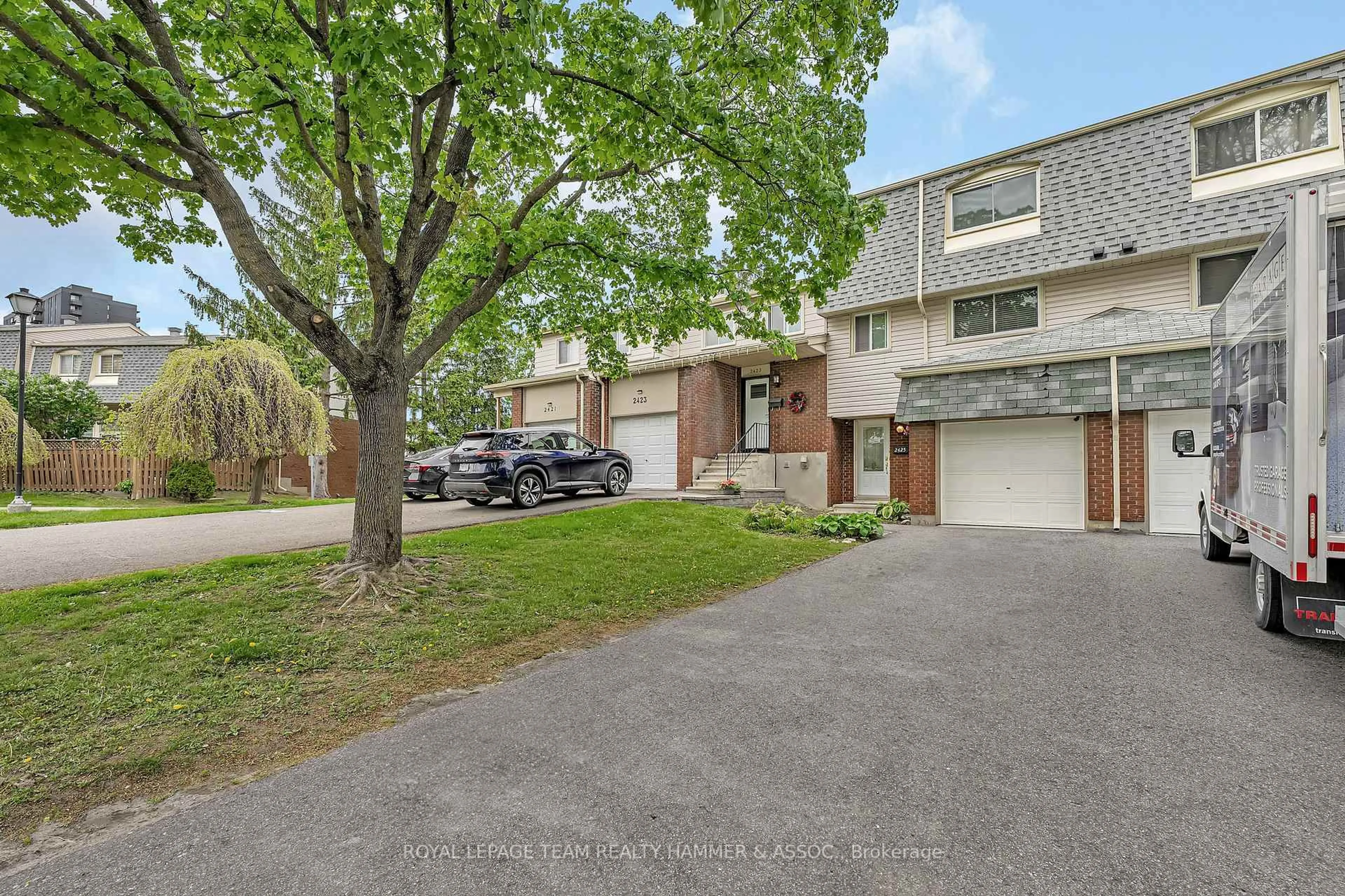 A pic from outside/outdoor area/front of a property/back of a property/a pic from drone, street for 2425 Southvale Cres #65, Ottawa Ontario K1B 4T8