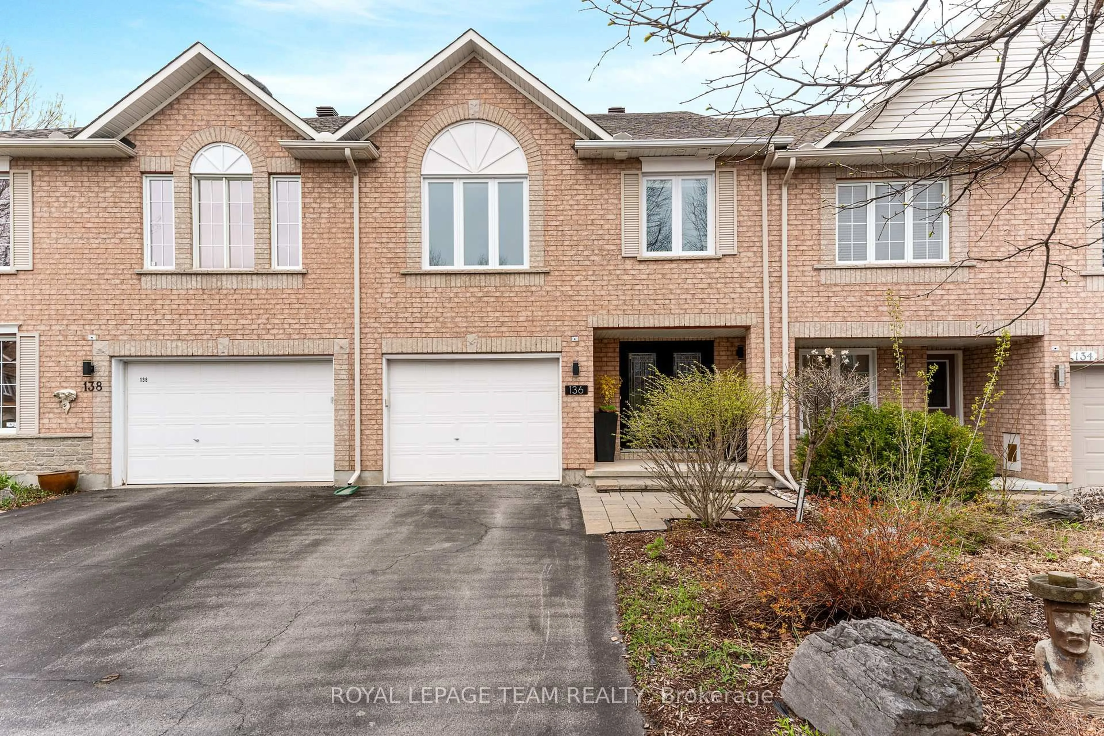 Home with brick exterior material, street for 136 Macassa Circ, Ottawa Ontario K2T 1J7