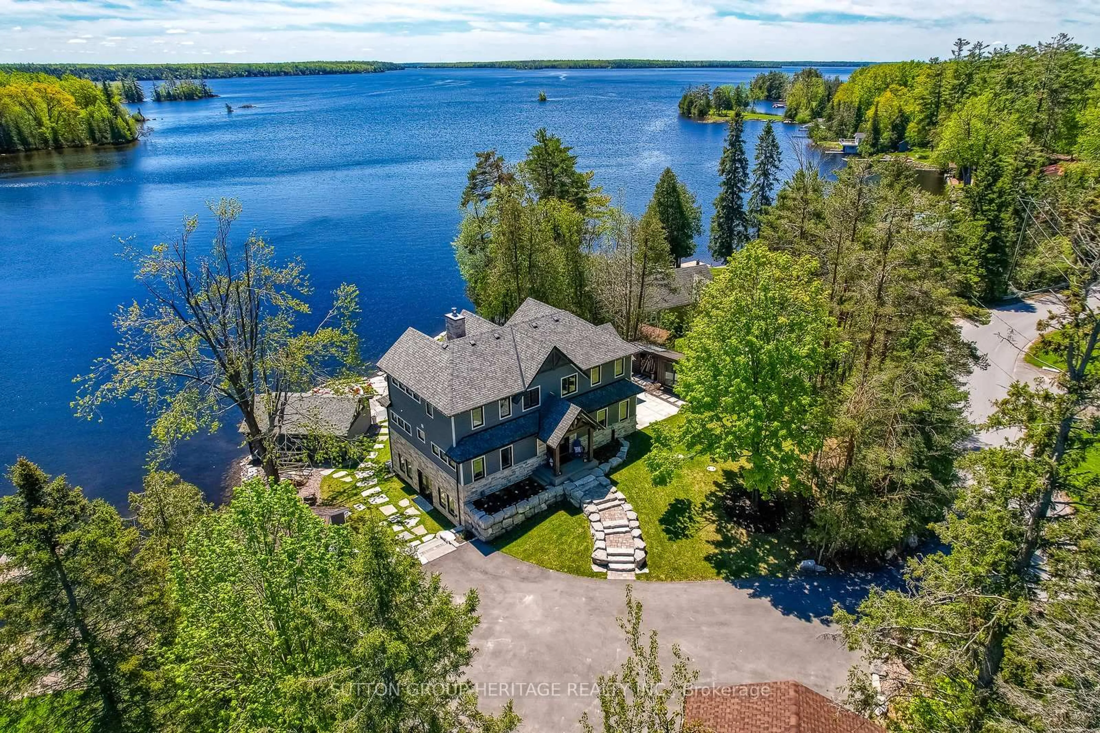 A pic from outside/outdoor area/front of a property/back of a property/a pic from drone, water/lake/river/ocean view for 30 Pirates Glen Dr, Trent Lakes Ontario K0M 1A0
