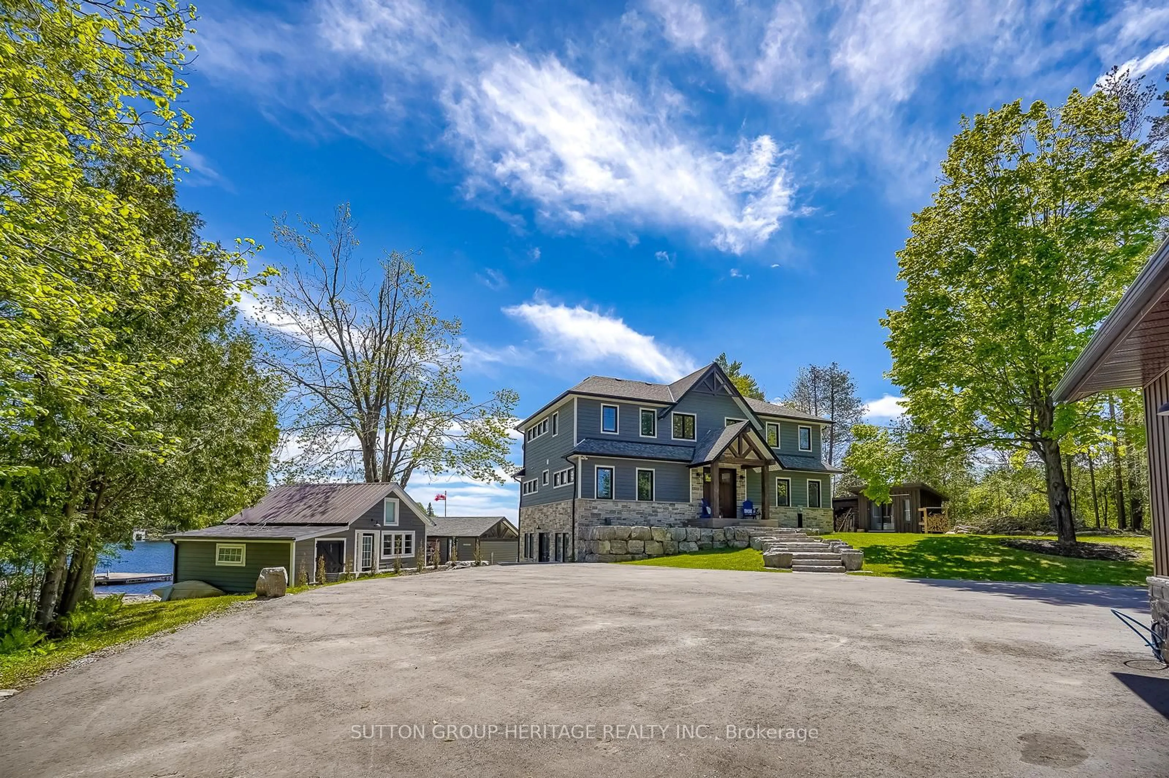A pic from outside/outdoor area/front of a property/back of a property/a pic from drone, water/lake/river/ocean view for 30 Pirates Glen Dr, Trent Lakes Ontario K0M 1A0