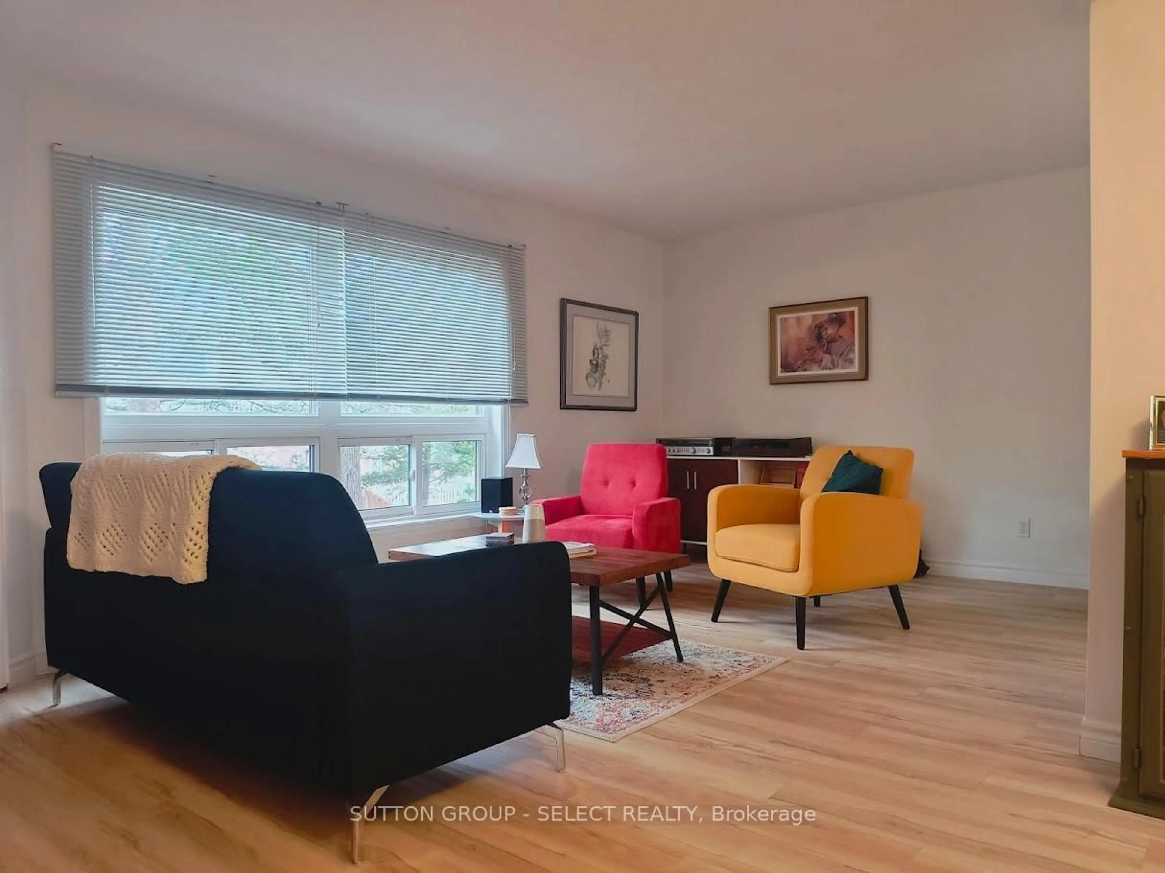 Living room with furniture, wood/laminate floor for 35 Waterman Ave #97, London South Ontario N6C 5T7