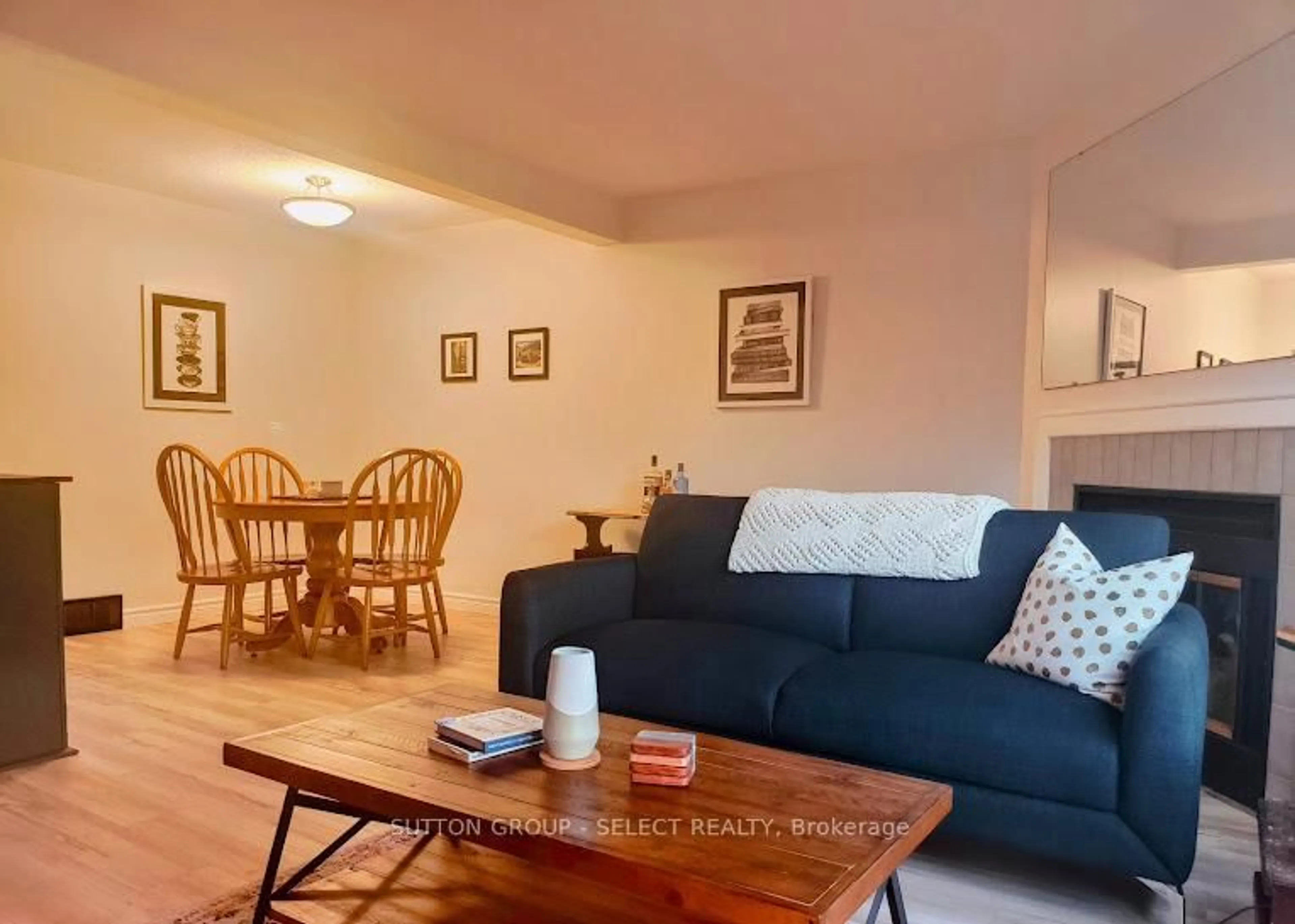 Living room with furniture, wood/laminate floor for 35 Waterman Ave #97, London South Ontario N6C 5T7