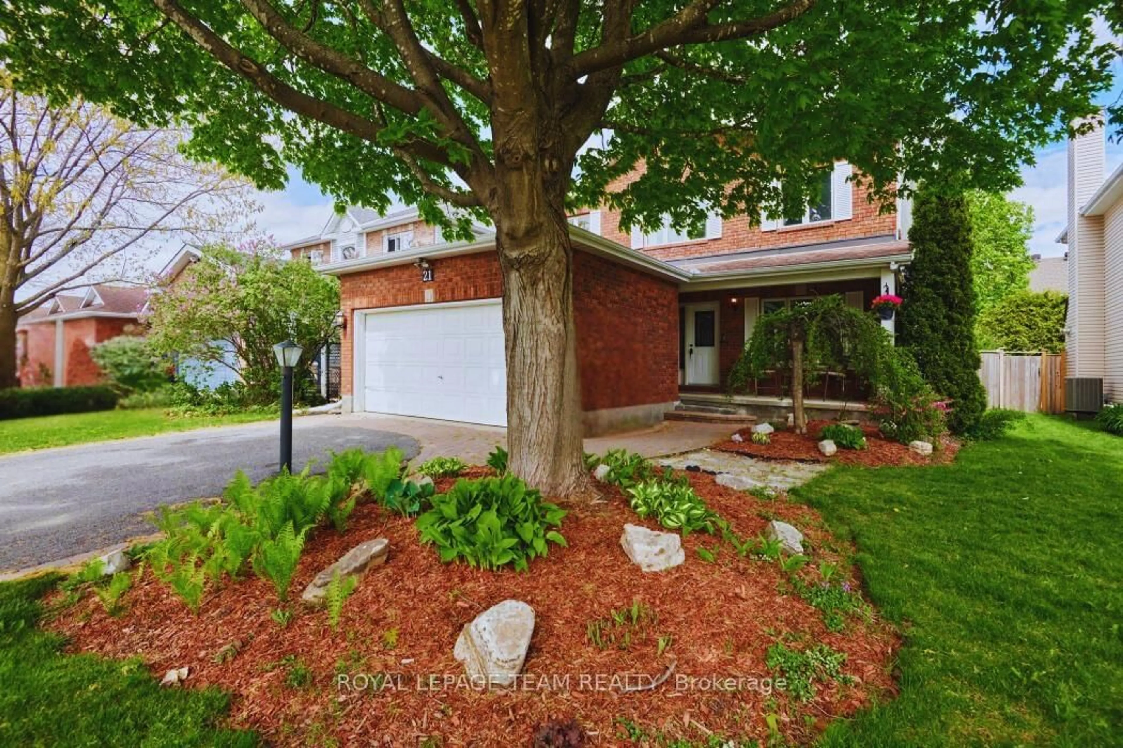 Home with brick exterior material, street for 21 Mayford Ave, Ottawa Ontario K2G 6A7
