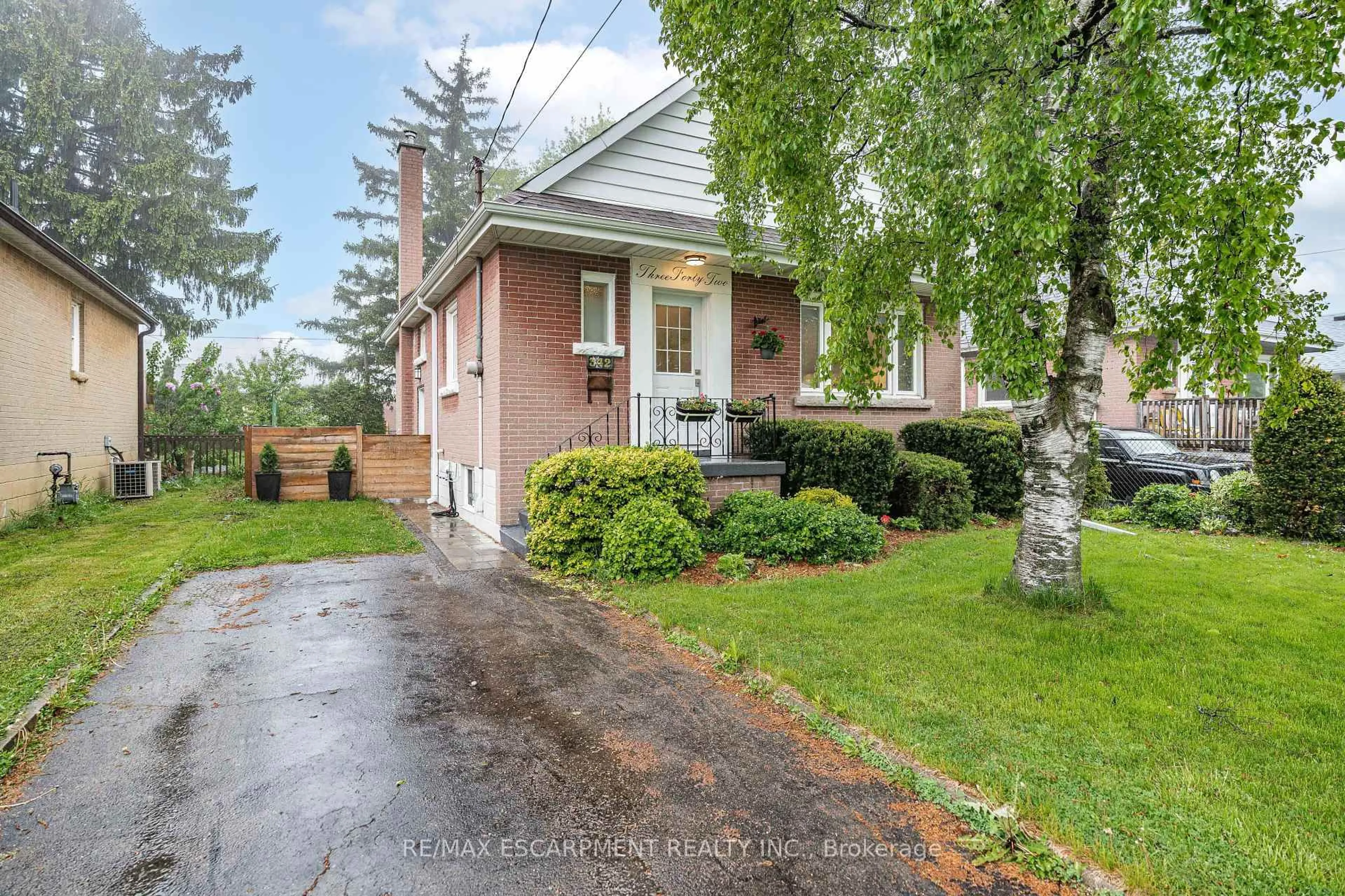 Home with brick exterior material, street for 342 East 15th St, Hamilton Ontario L9A 4G5