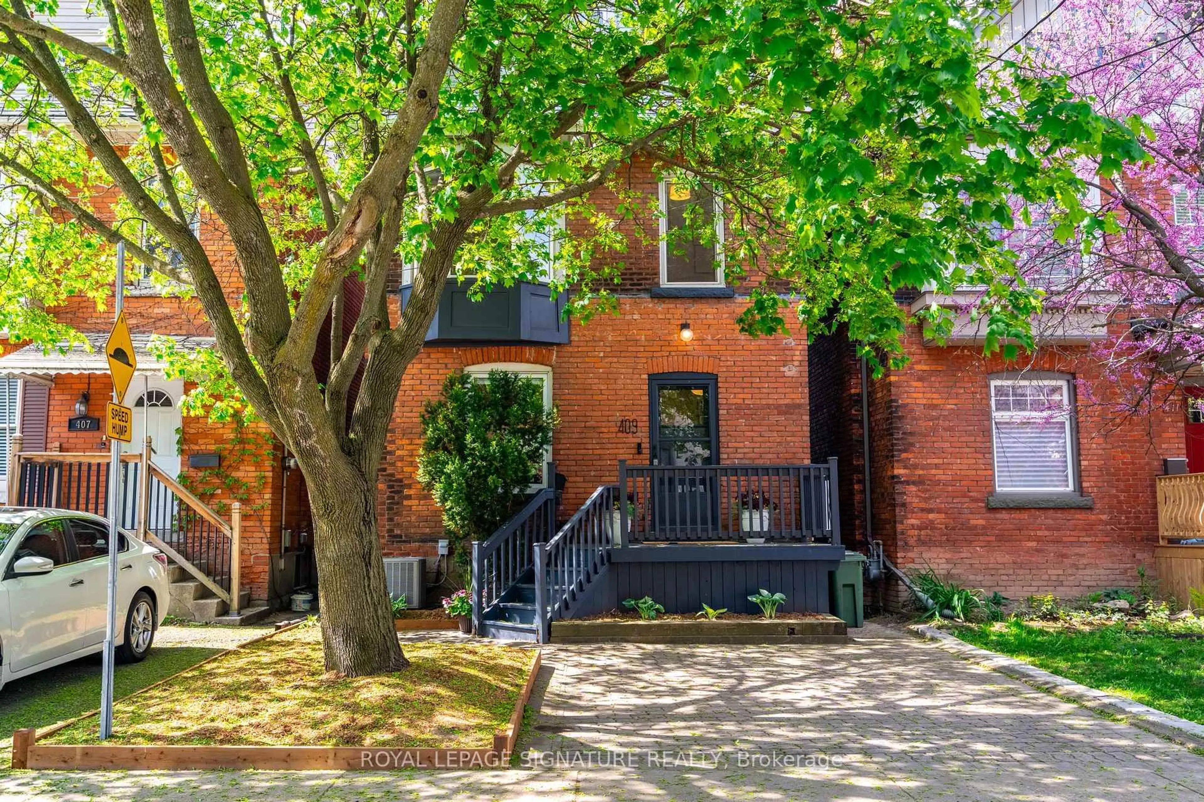 Home with brick exterior material, street for 409 Herkimer St, Hamilton Ontario L8P 2J4