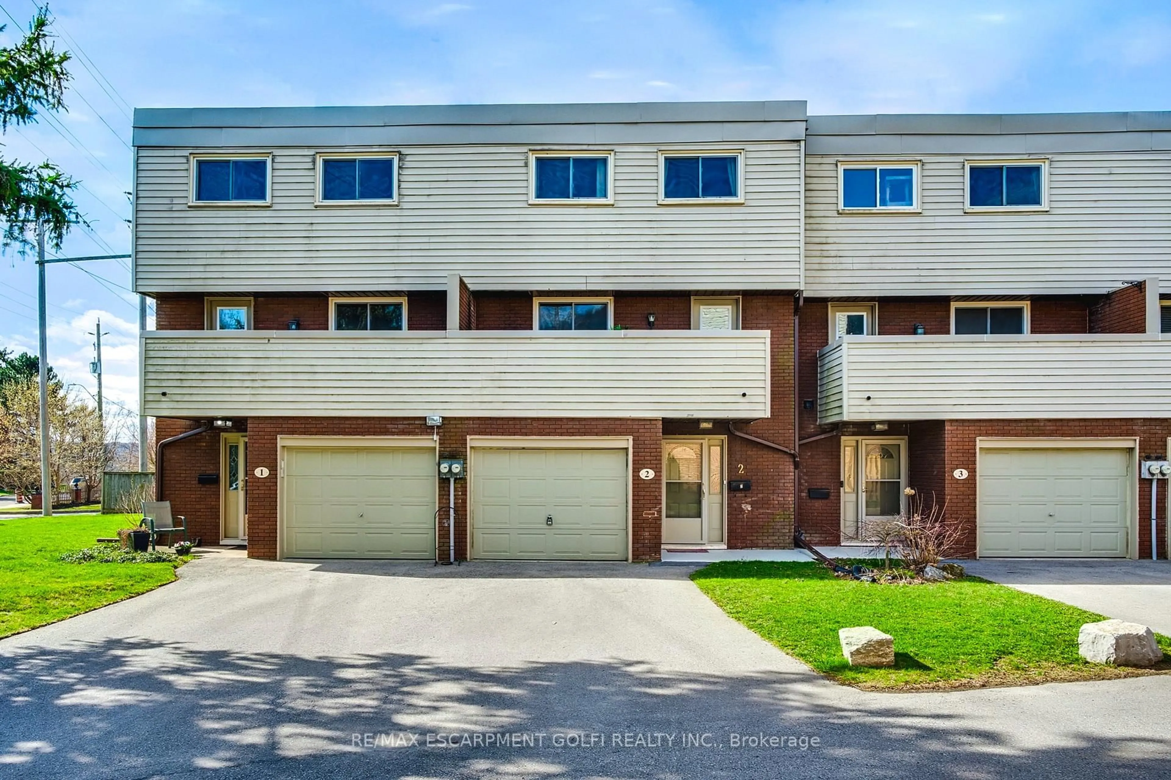 Home with brick exterior material, street for 23 WATSONS Lane #2, Hamilton Ontario L9H 5G9