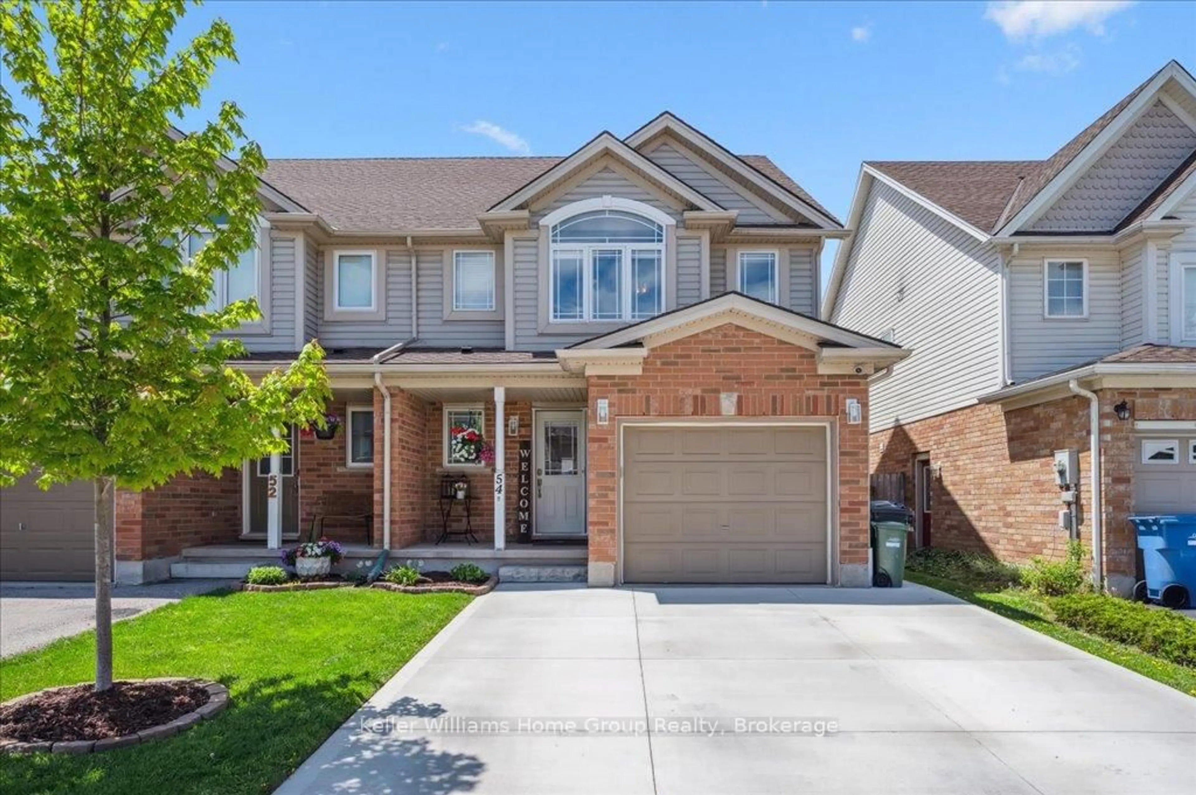 Home with brick exterior material, street for 54 Schiedel Dr, Guelph Ontario N1E 7M1