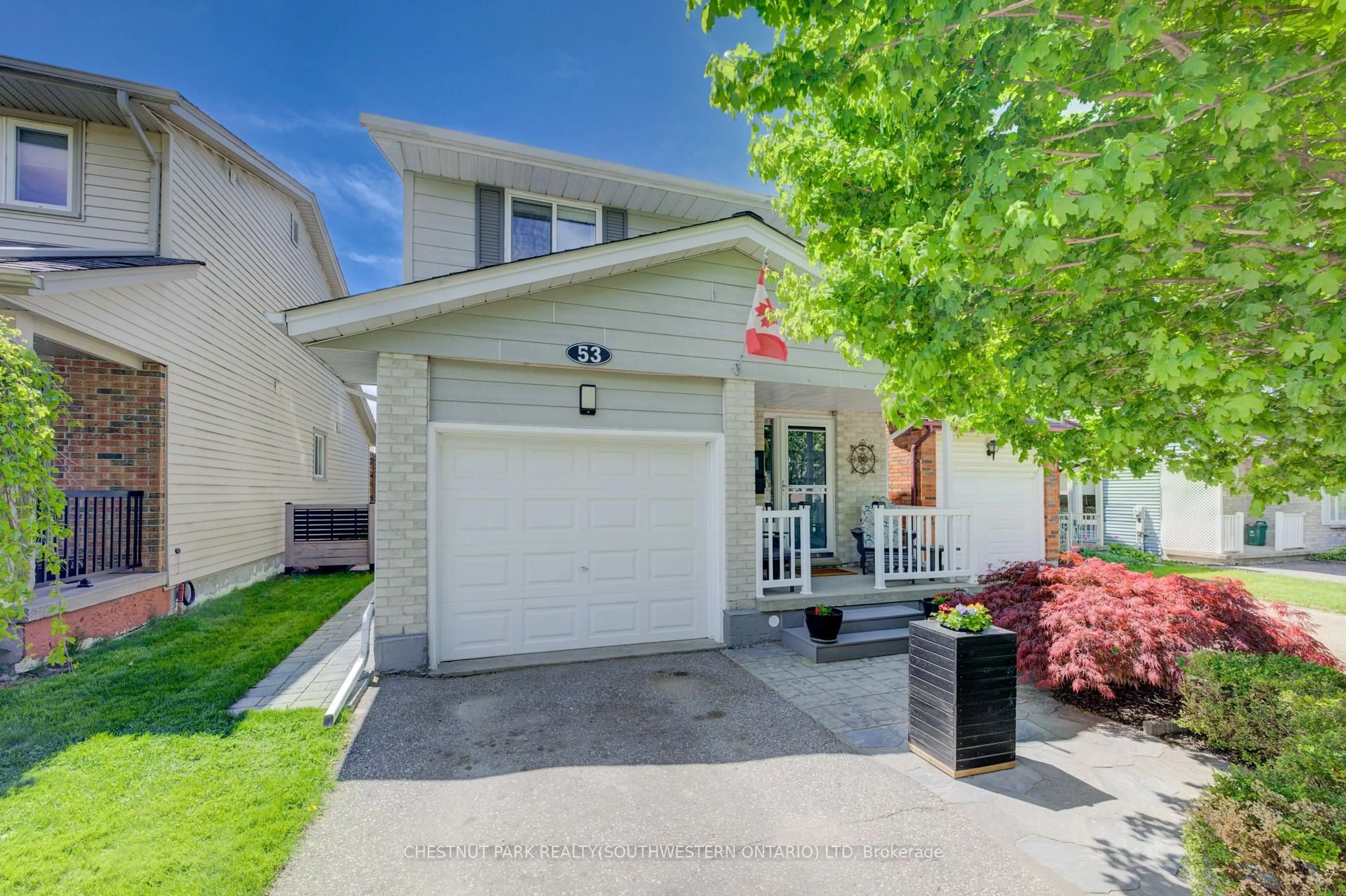 Home with vinyl exterior material, street for 53 Ristau Cres, Kitchener Ontario N2E 3A8