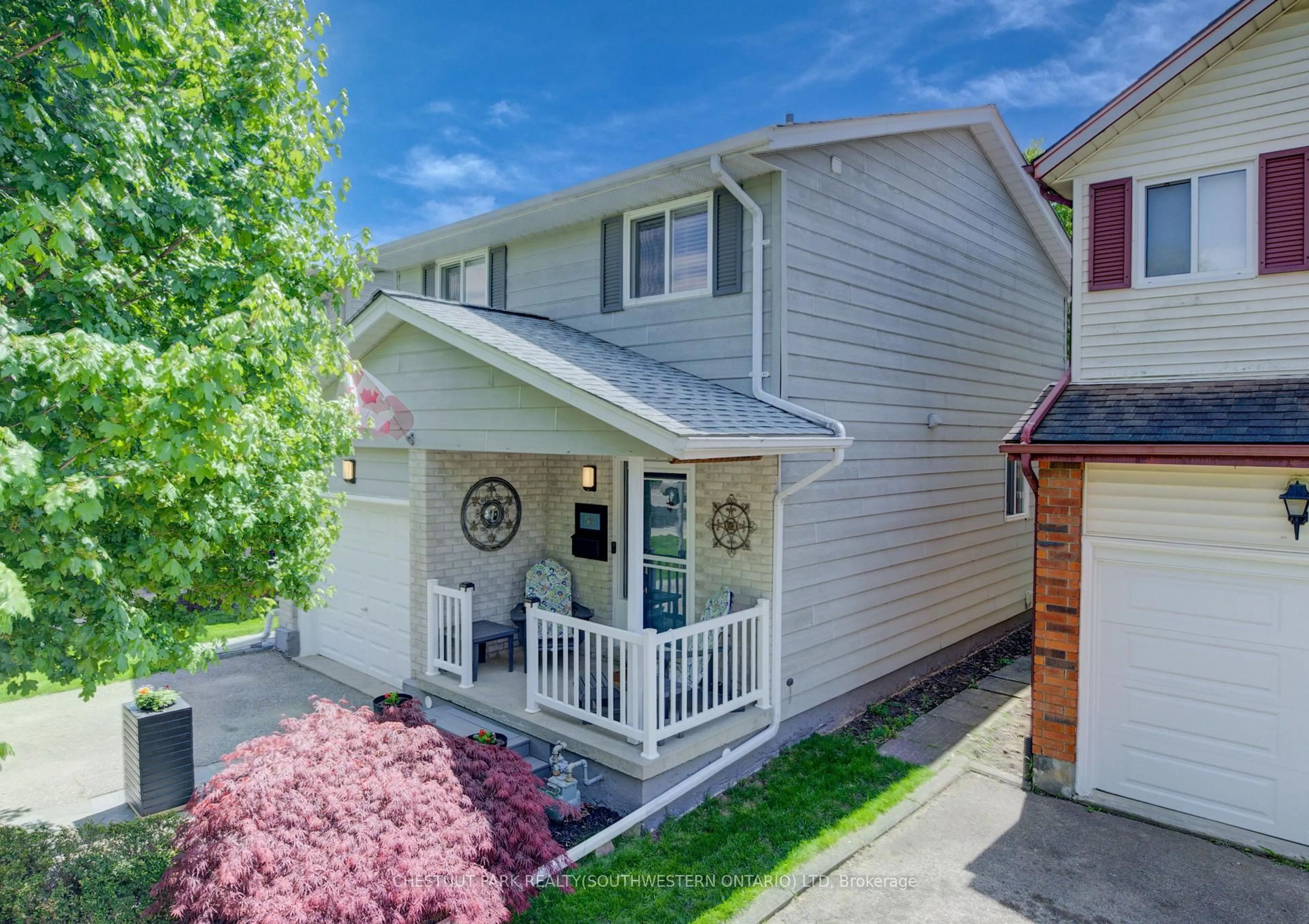 Home with vinyl exterior material, street for 53 Ristau Cres, Kitchener Ontario N2E 3A8