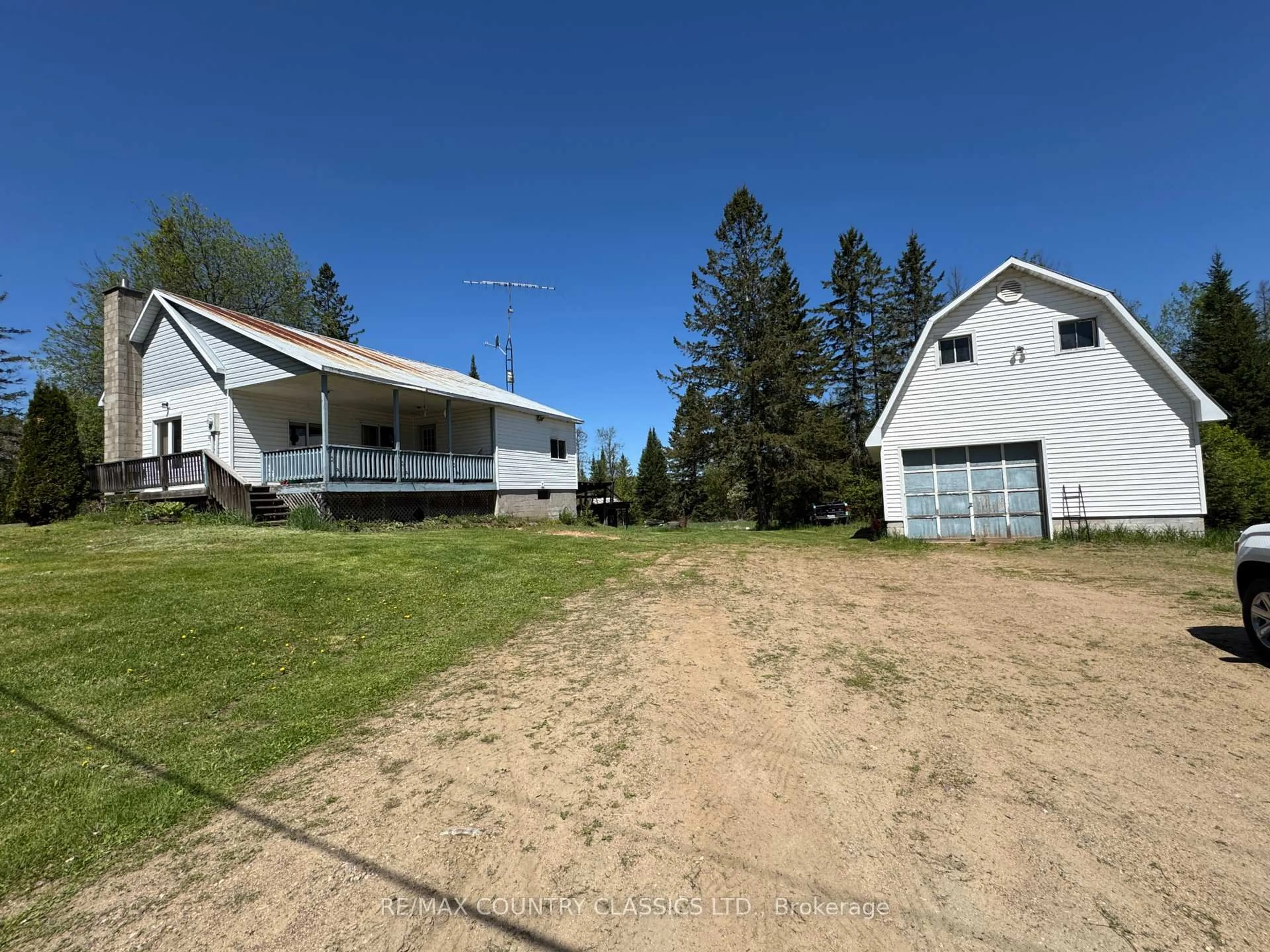 A pic from outside/outdoor area/front of a property/back of a property/a pic from drone, unknown for 929 Musclow Greenview Rd, Bancroft Ontario K0L 1C0