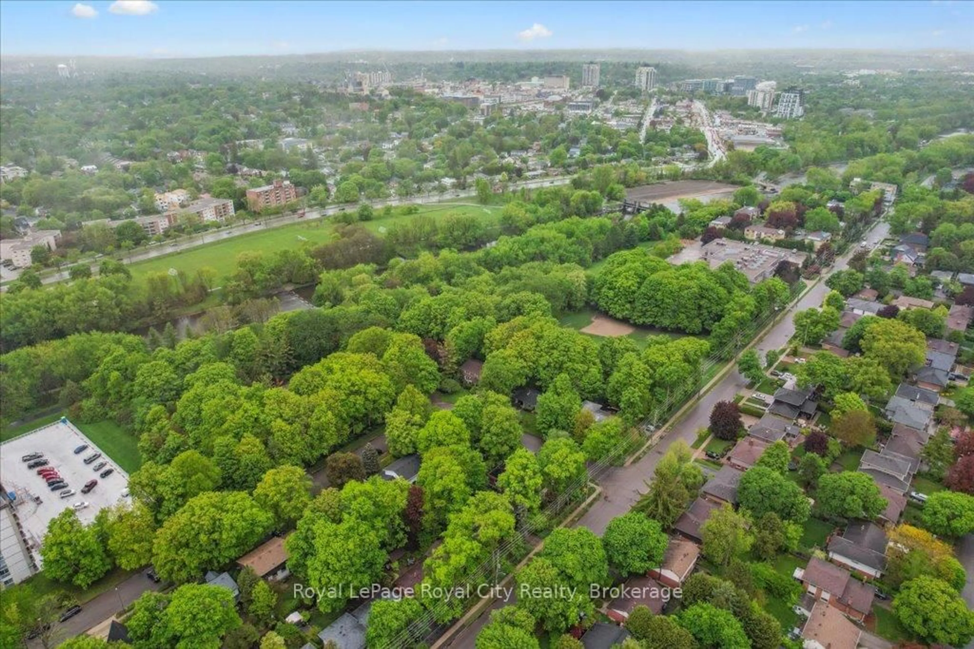 A pic from outside/outdoor area/front of a property/back of a property/a pic from drone, forest/trees view for 229 Water St, Guelph Ontario N1G 1B4