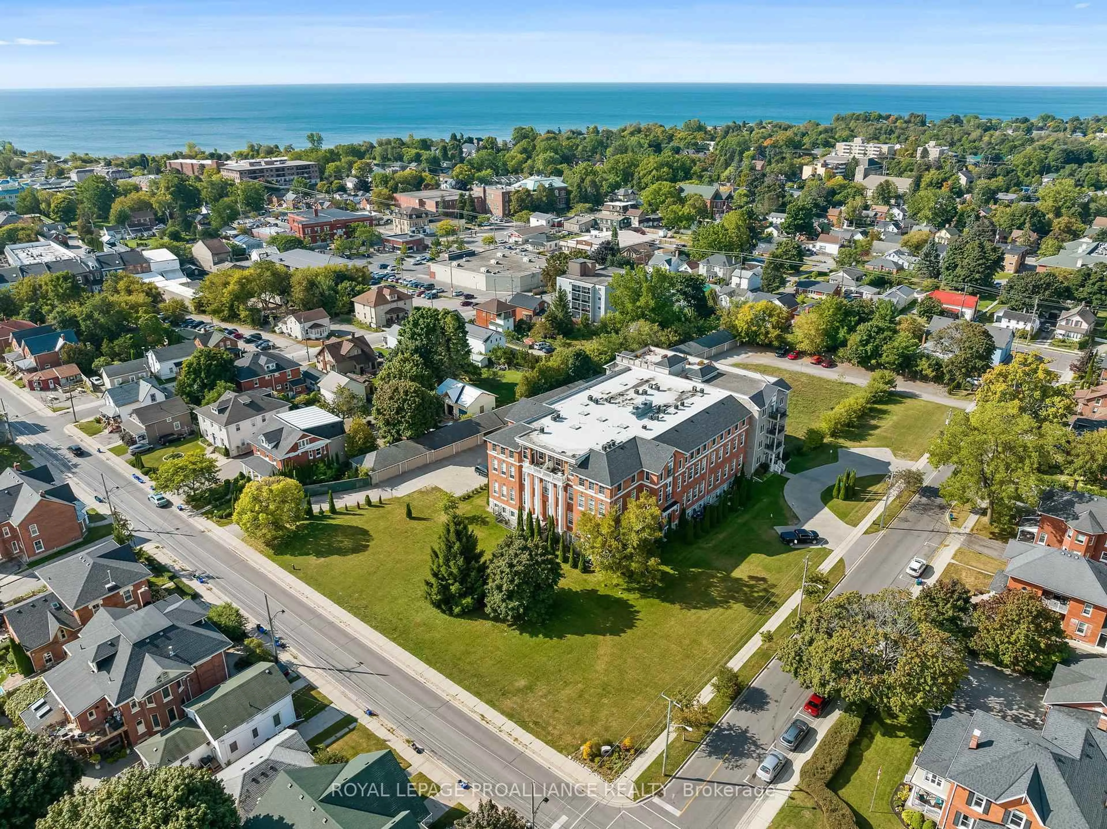 A pic from outside/outdoor area/front of a property/back of a property/a pic from drone, street for 323 George St #206, Cobourg Ontario K9A 3L9
