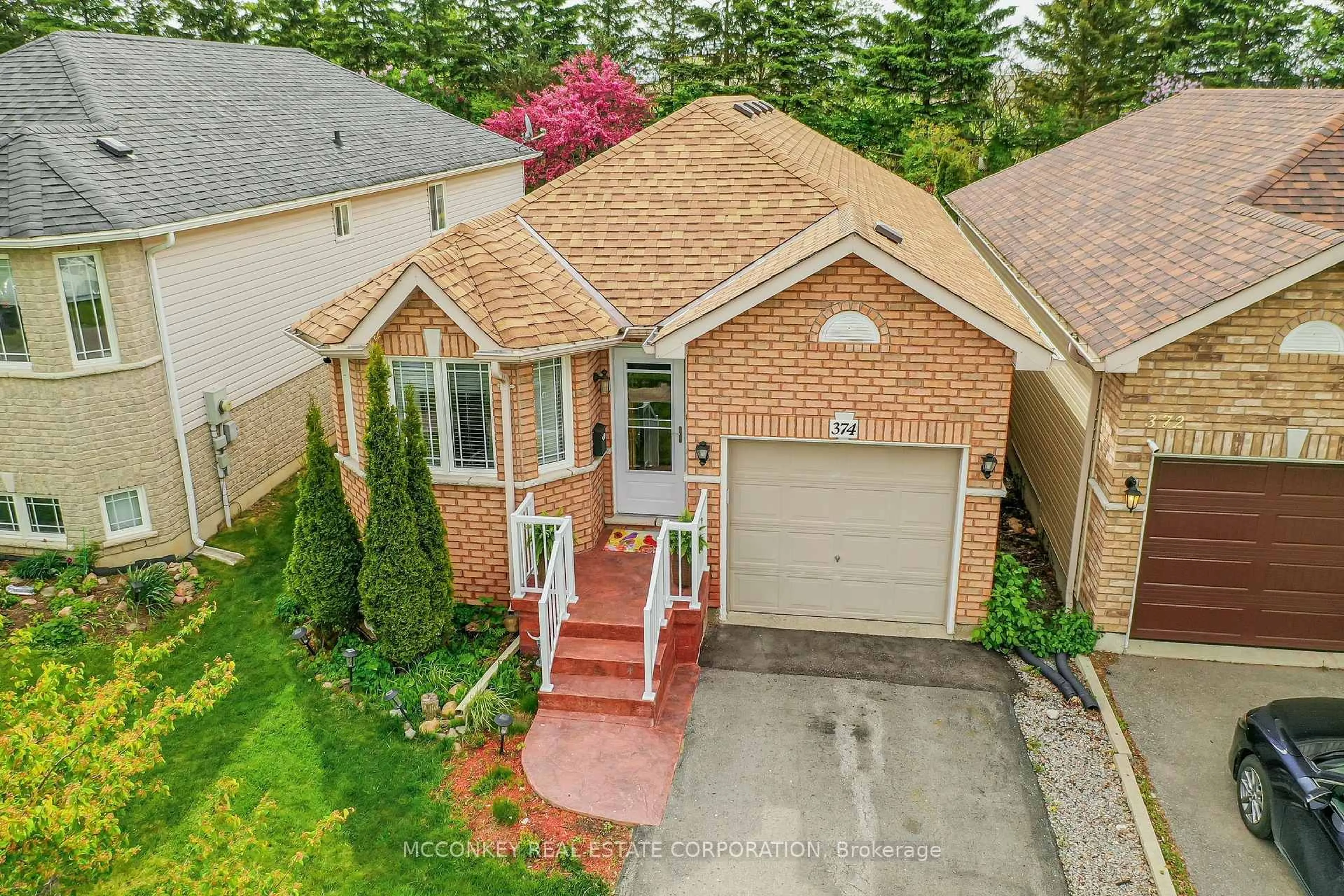 A pic from outside/outdoor area/front of a property/back of a property/a pic from drone, street for 374 SPILLSBURY Dr, Peterborough West Ontario K9K 2N6